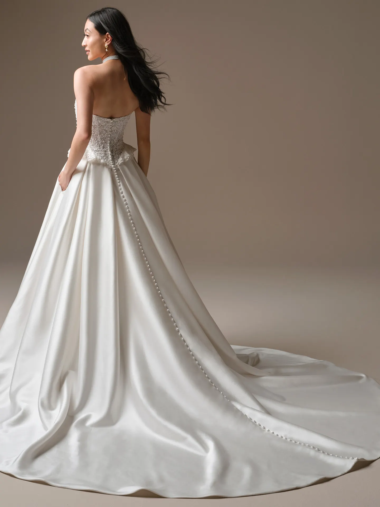 Maggie Sottero London, back view strapless beaded lace ballgown wedding dress.
