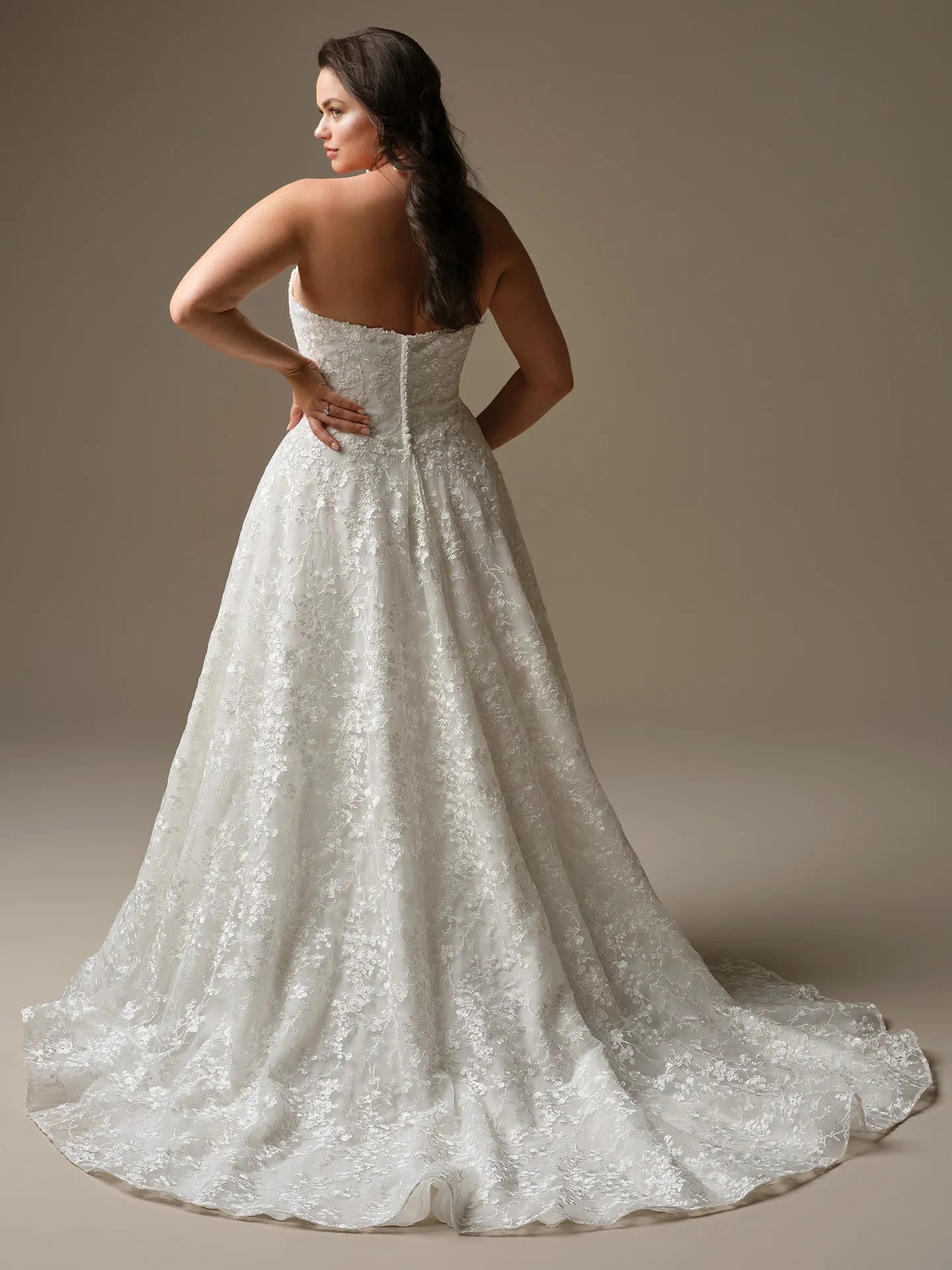 Maggie Sottero Memphis, back view, A-Line wedding dress with floral lace and train.