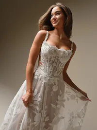 Detachable tulle shoulder straps with unembellished all over lace