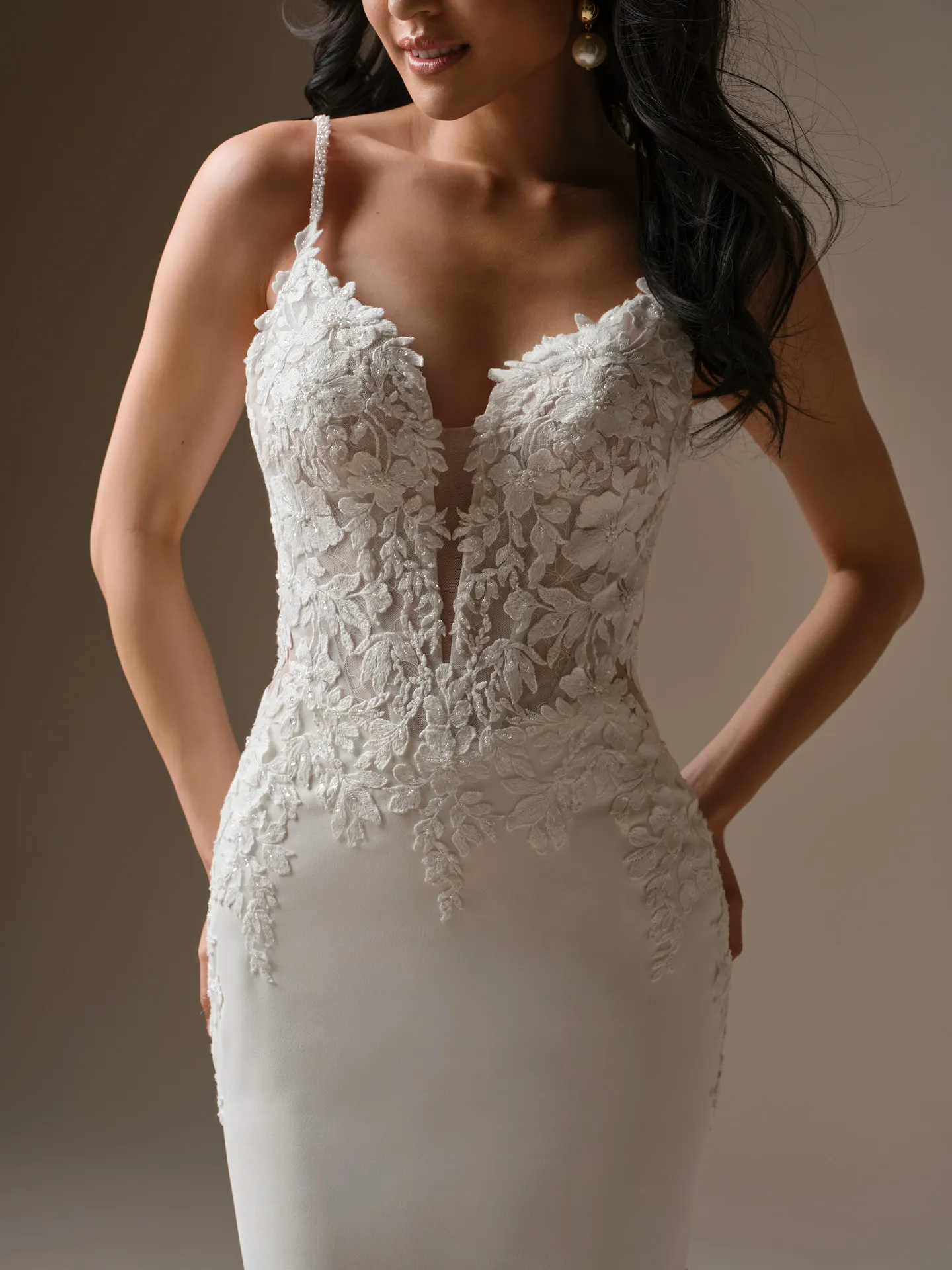 Maggie Sottero Noelle beaded lace sheath wedding dress, front view.
