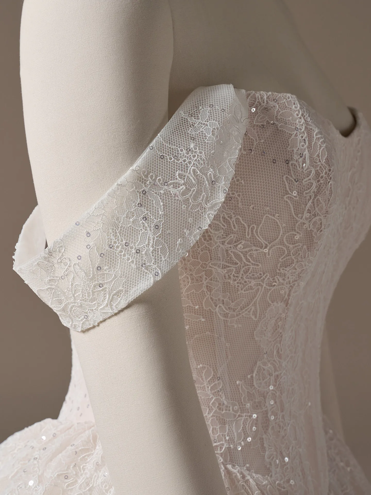 Maggie Sottero Raquel lace sleeve detail, side view.