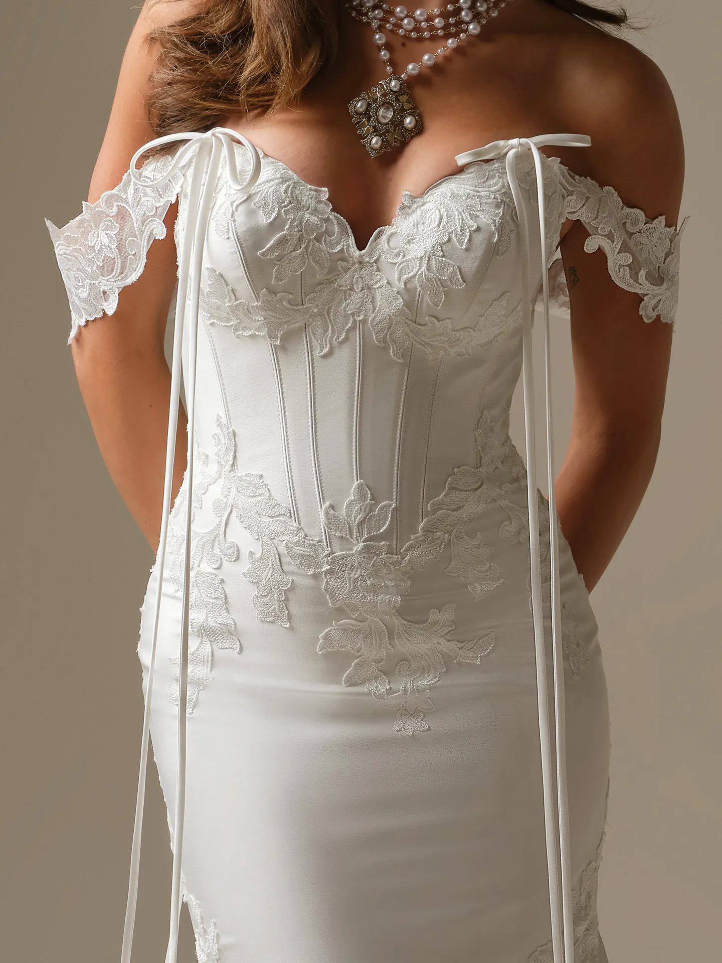 Maggie Sottero Serafina Lane detachable cap sleeves, front view.