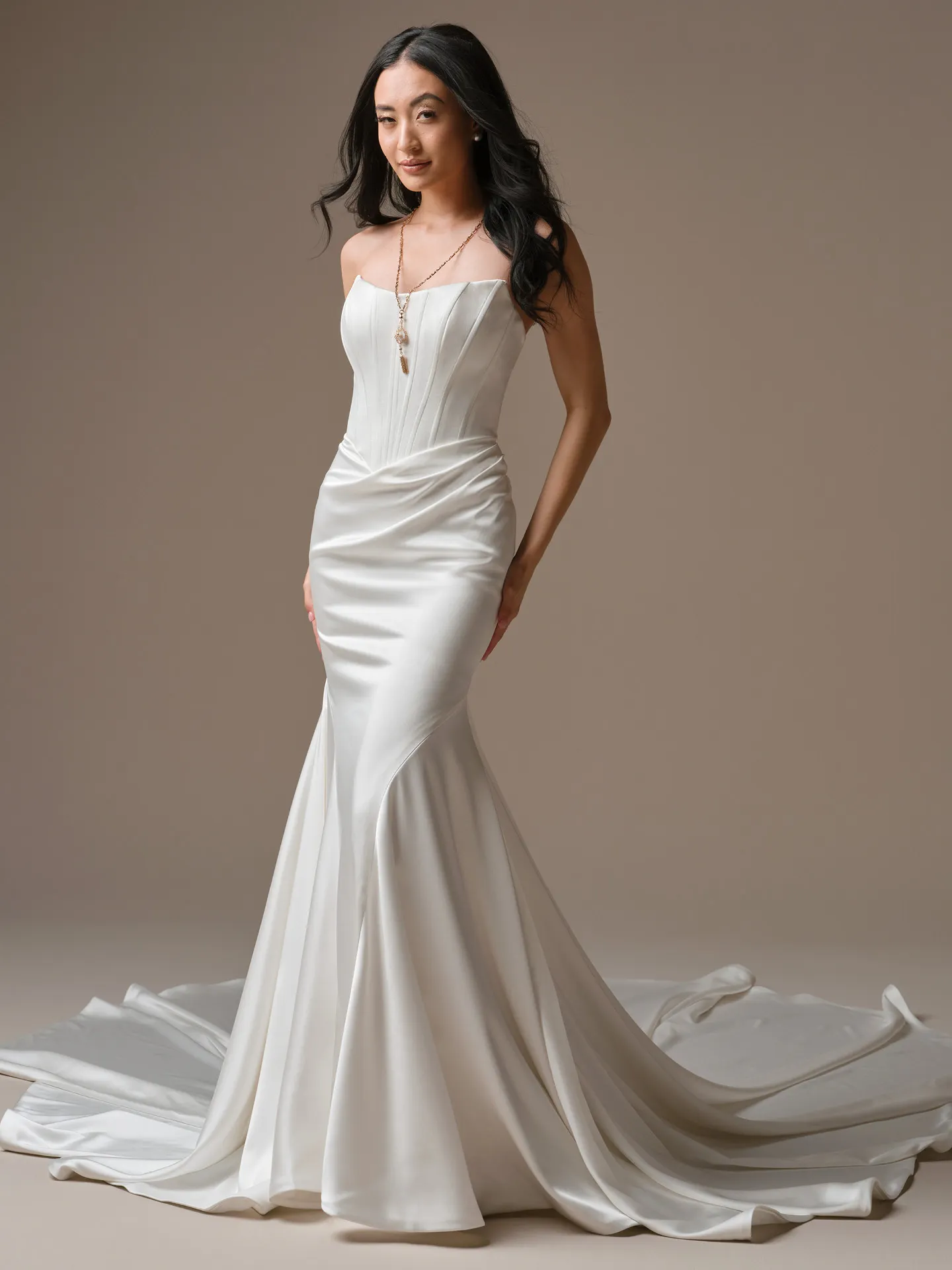 Maggie Sottero Sinclaire sheath, front view, cat eye neckline and elegant draping.