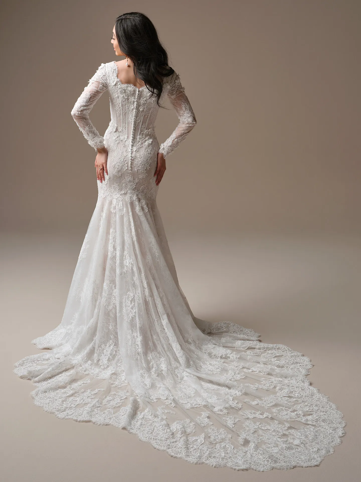 Maggie Sottero Takera 3-D floral lace mermaid, back view Maggie Sottero.