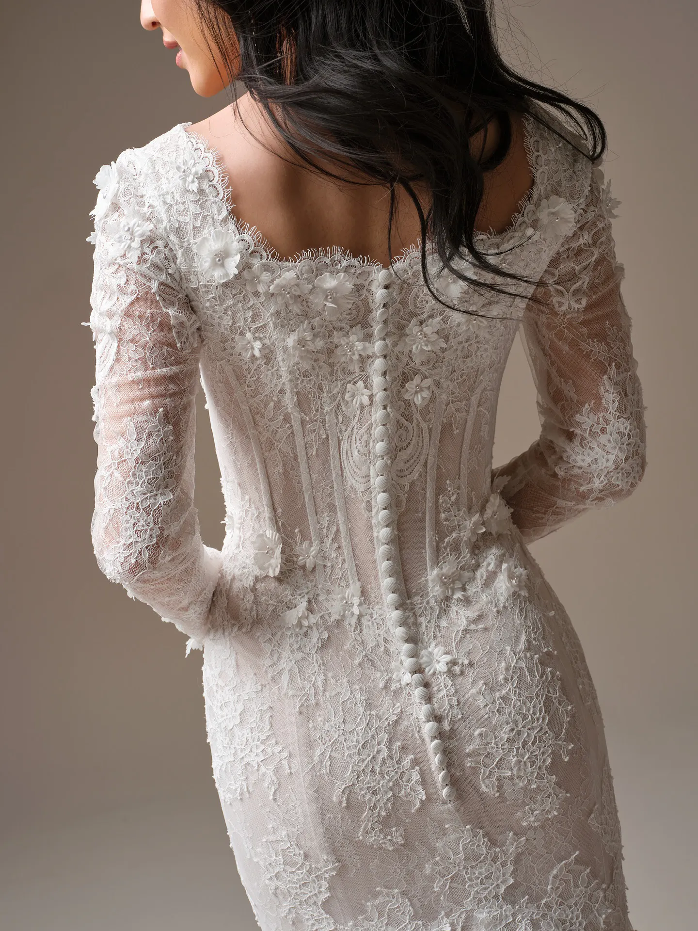 Maggie Sottero Takera, back view, floral lace mermaid wedding dress with buttons.