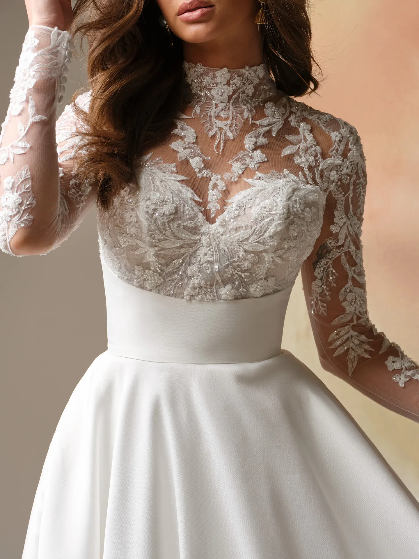 Maggie Sottero Trinity, front view, lace bodice, long sleeves, A-line wedding dress.