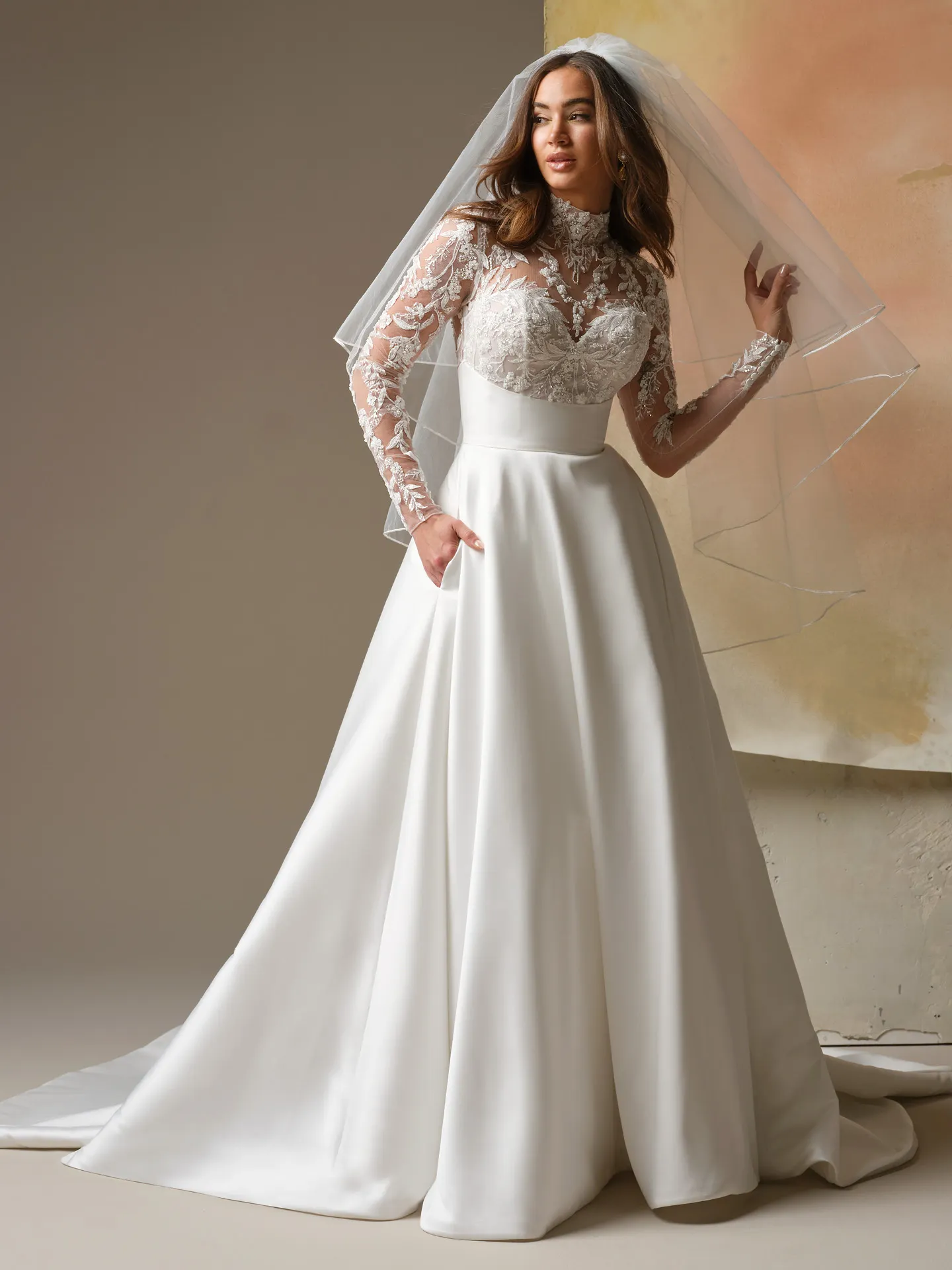 Maggie Sottero Trinity, front view lace sleeves veil A-line dress.