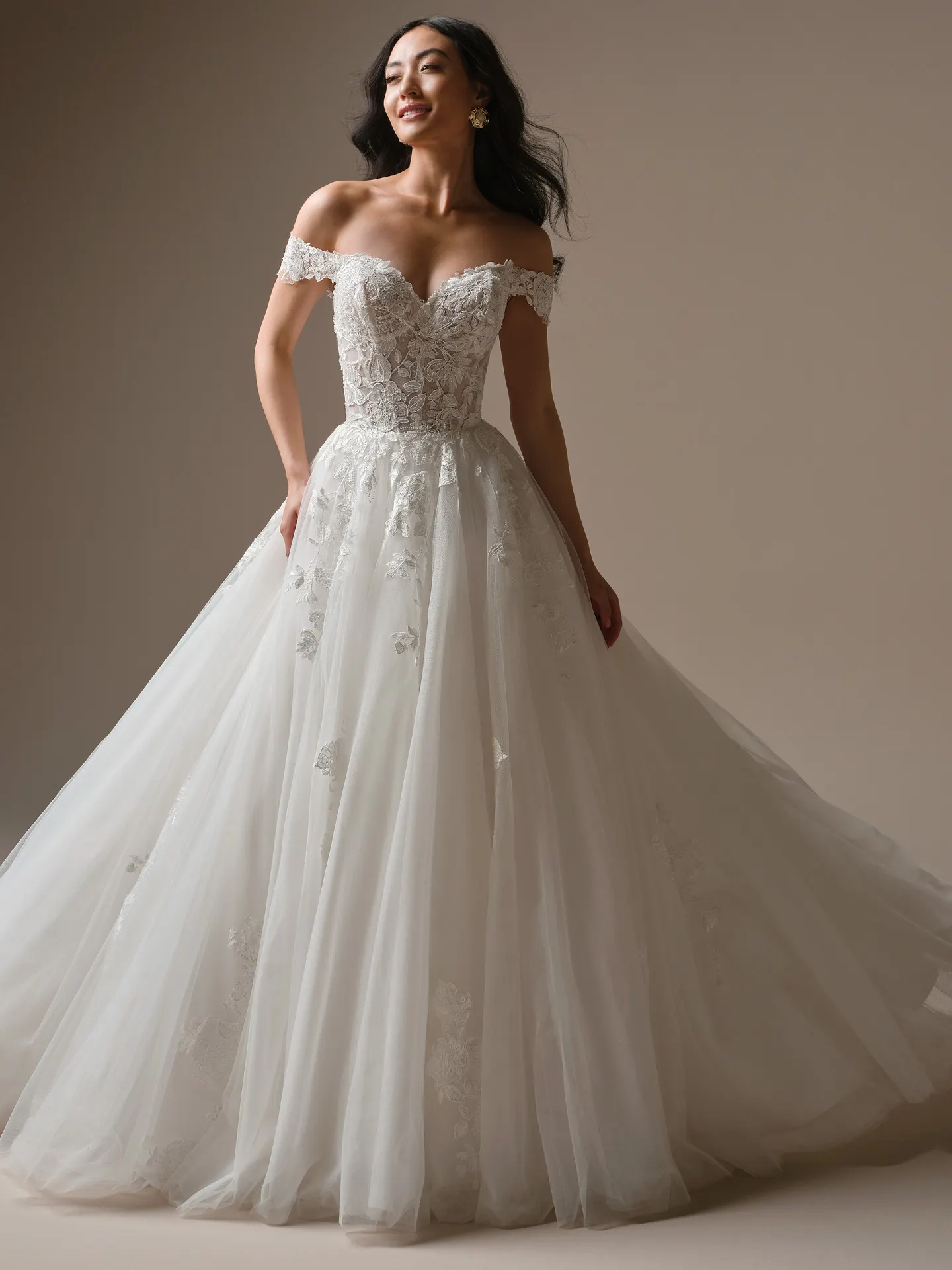 Maggie Sottero Verina, front view off-shoulder lace A-line wedding dress.