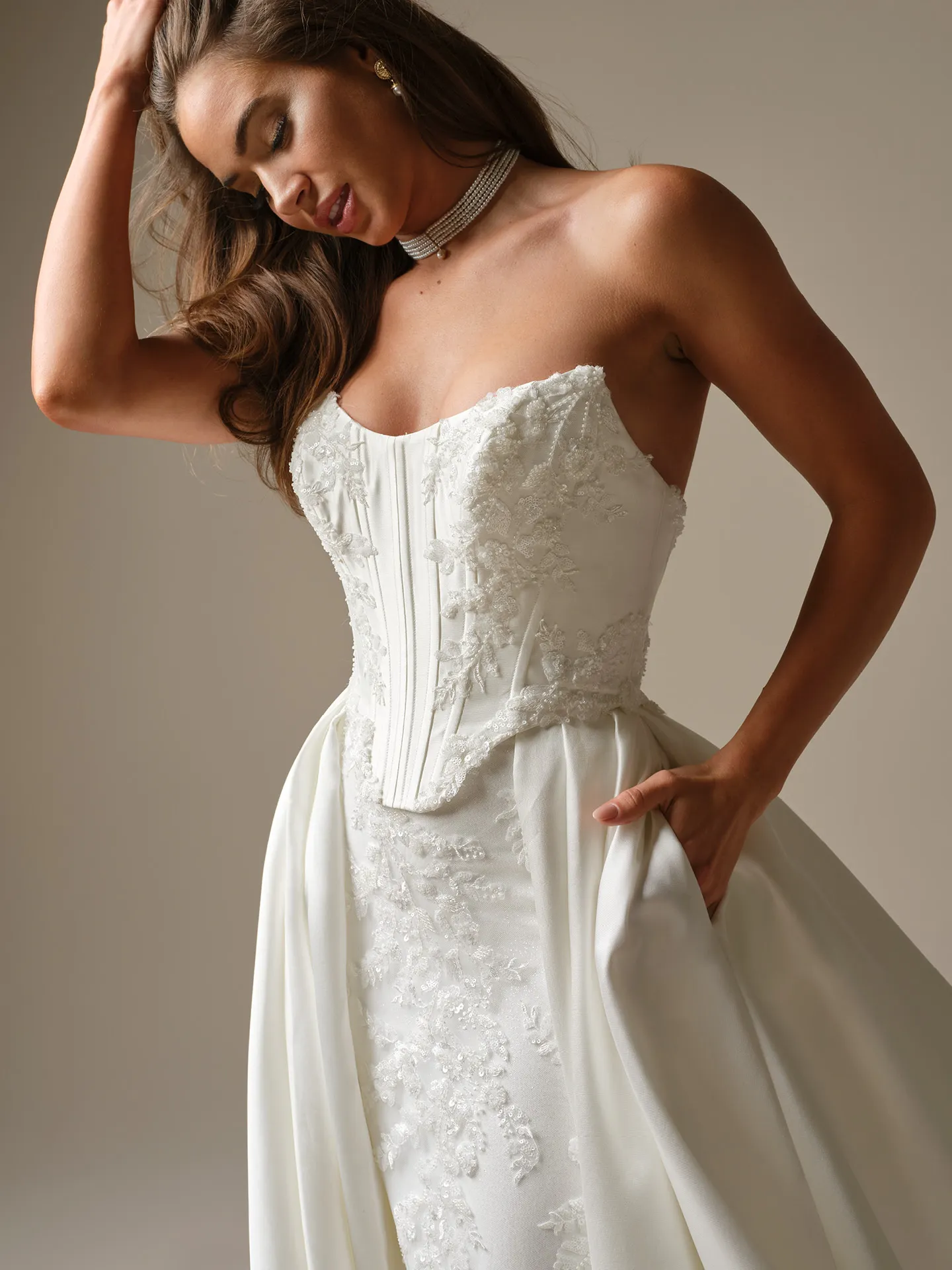 Maggie Sottero Wyntelle fit-and-flare, front view with lace detail and corset bodice.