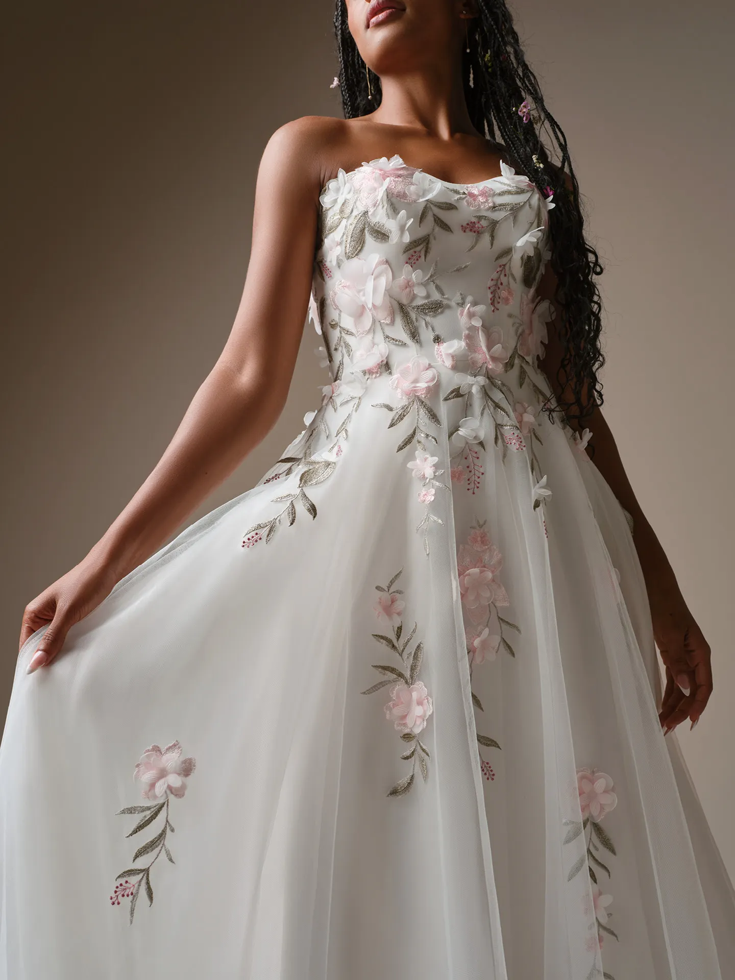 Rebecca Ingram Blossom, front view 3-D floral lace strapless A-Line wedding dress.