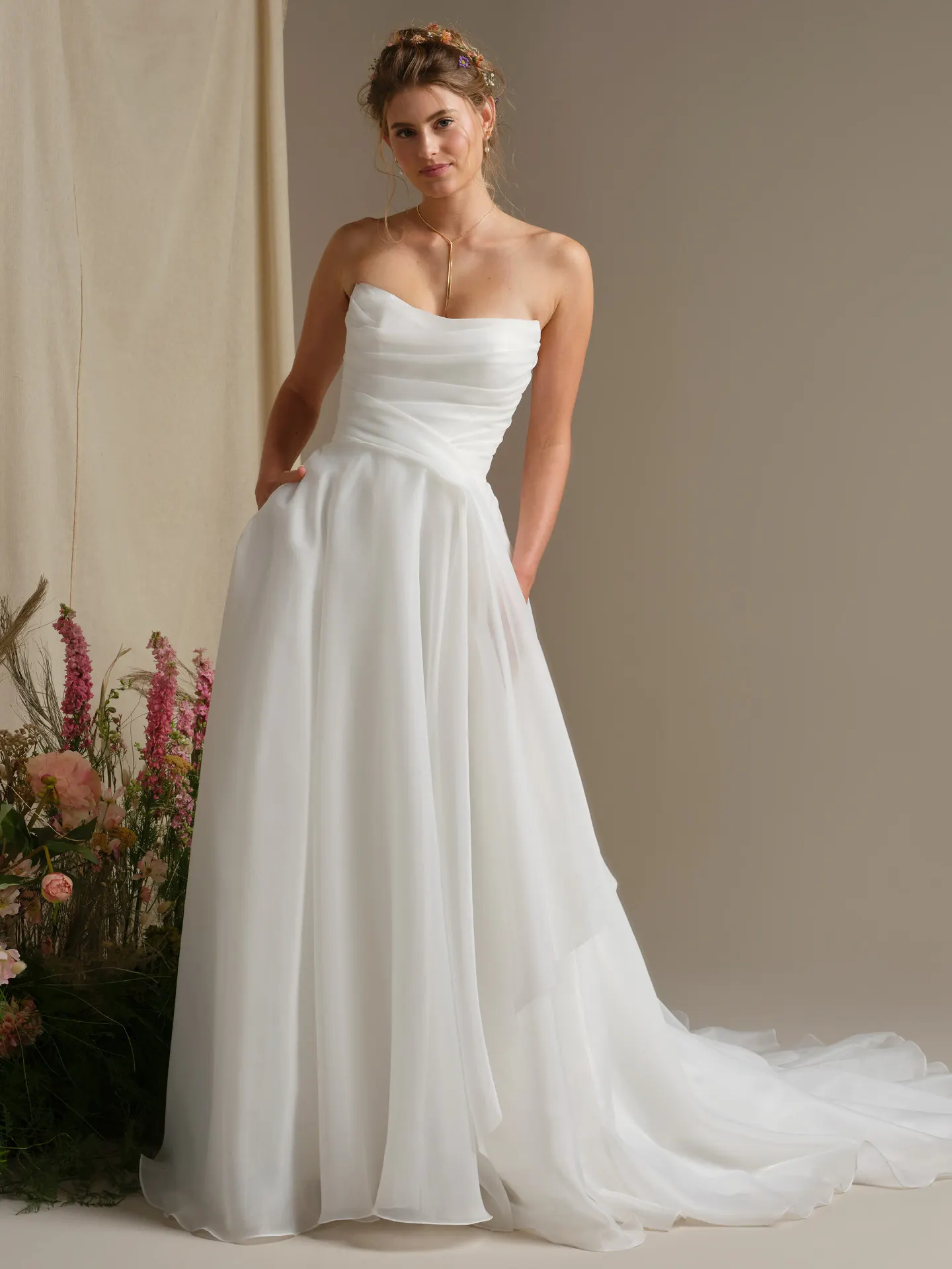 Rebecca Ingram Dezi, front view organza ballgown wedding dress with cat eye neckline.