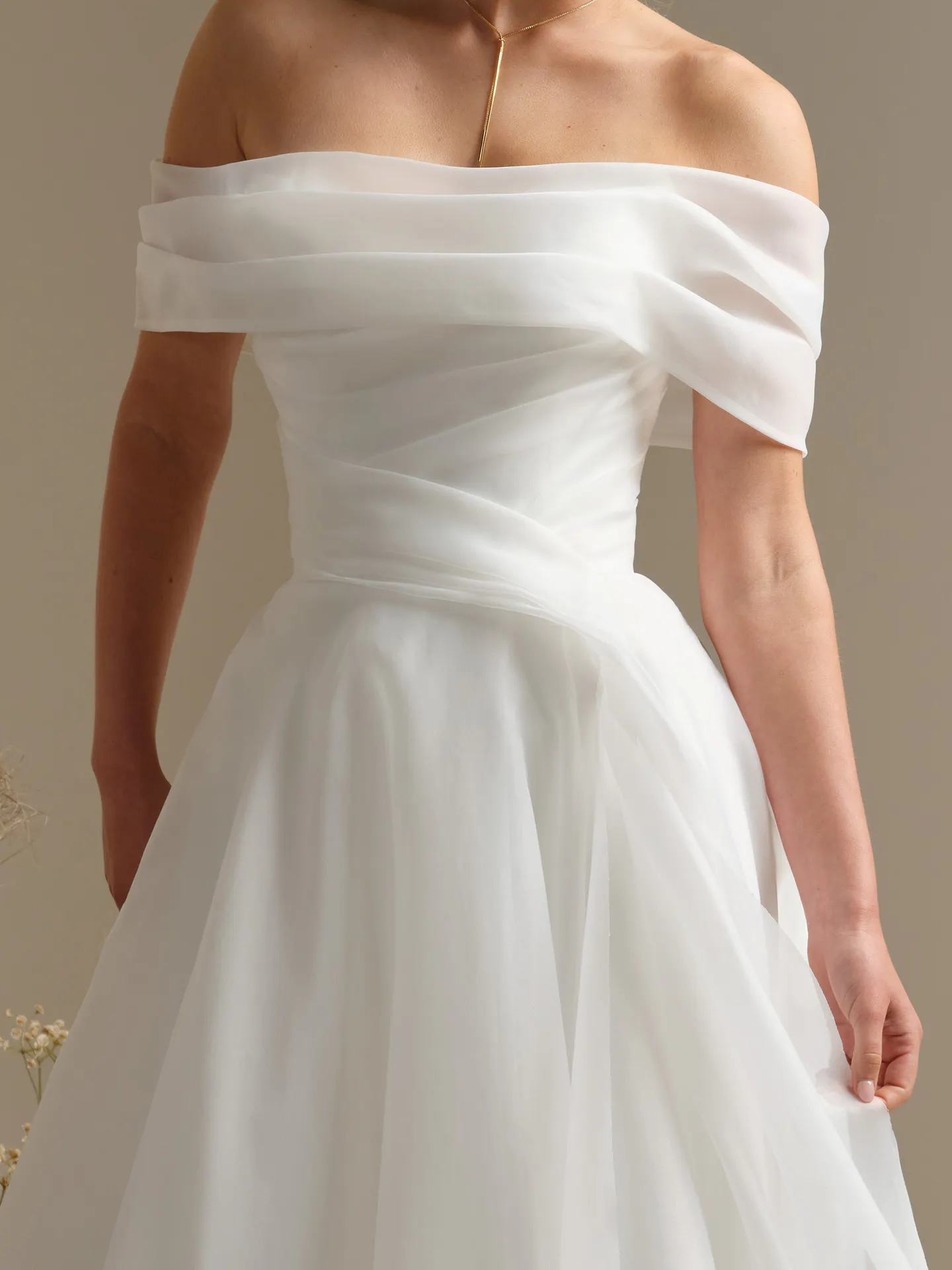 Rebecca Ingram Dezi, front view, pleated organza shoulder wrap.