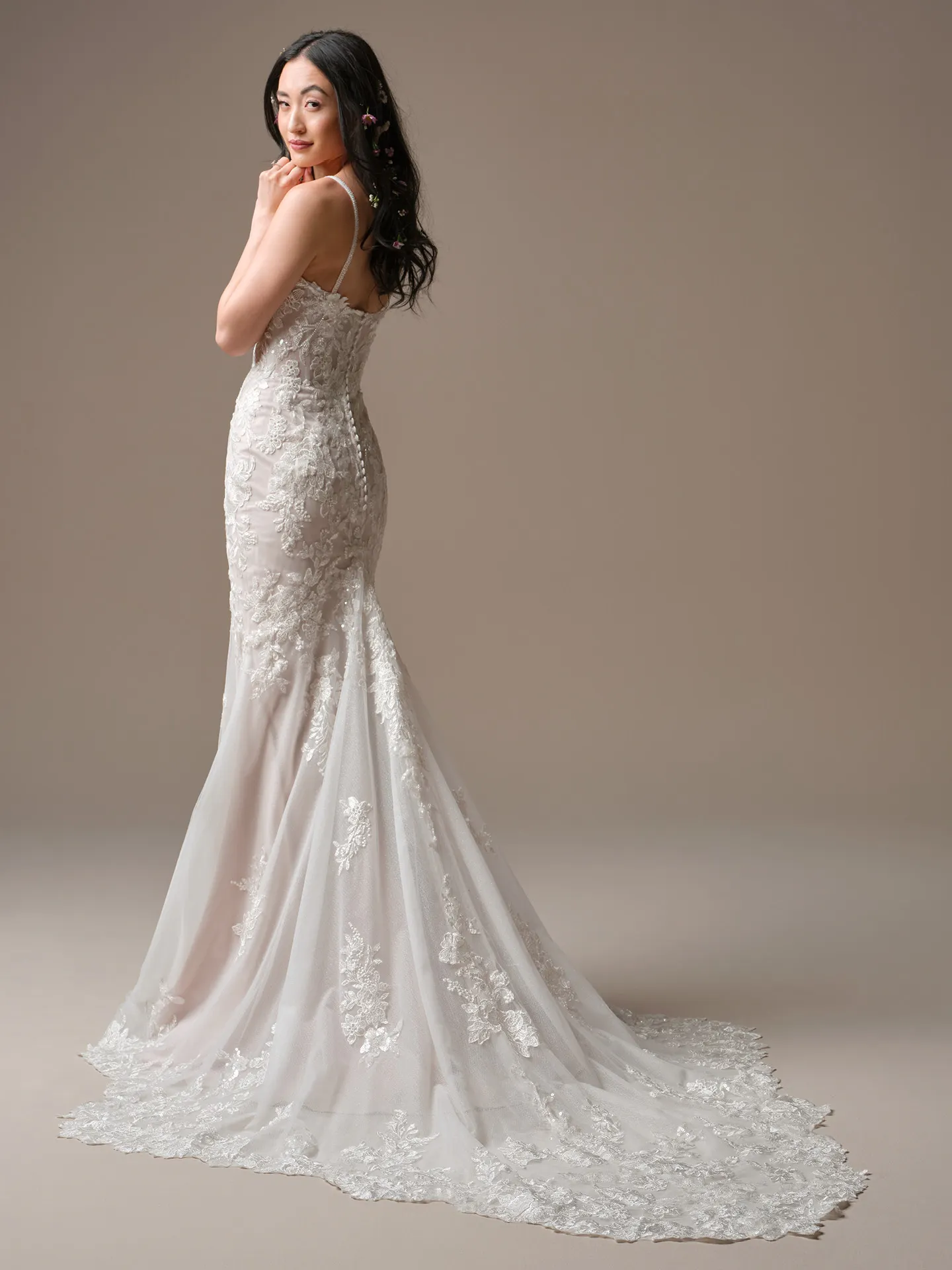 Rebecca Ingram Eden back view lace fit-and-flare wedding dress with illusion details