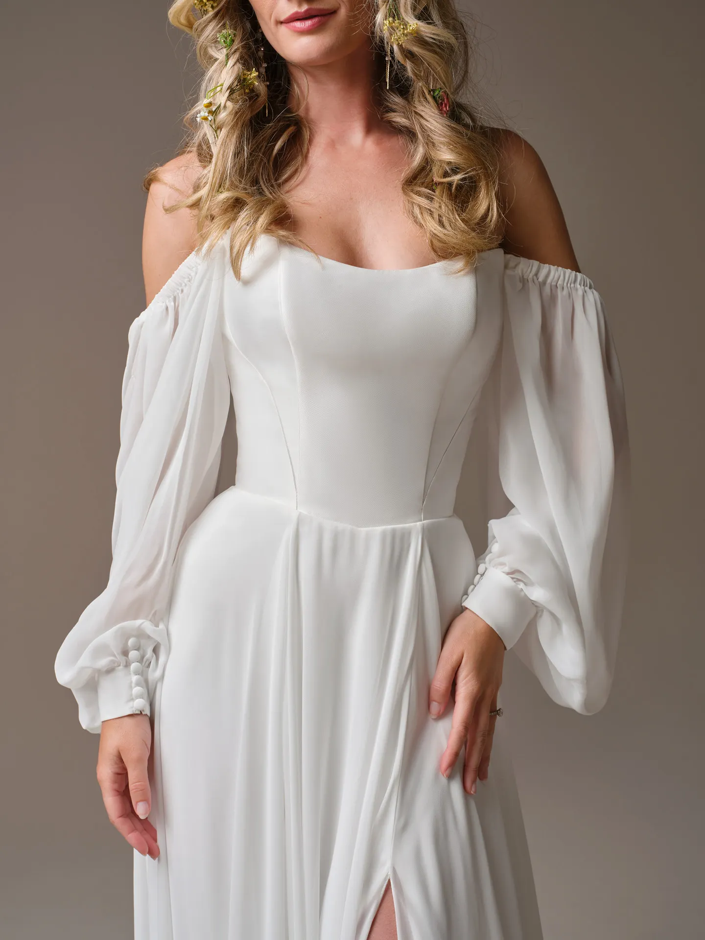 Rebecca Ingram Georgina front view with long sleeves and slit skirt