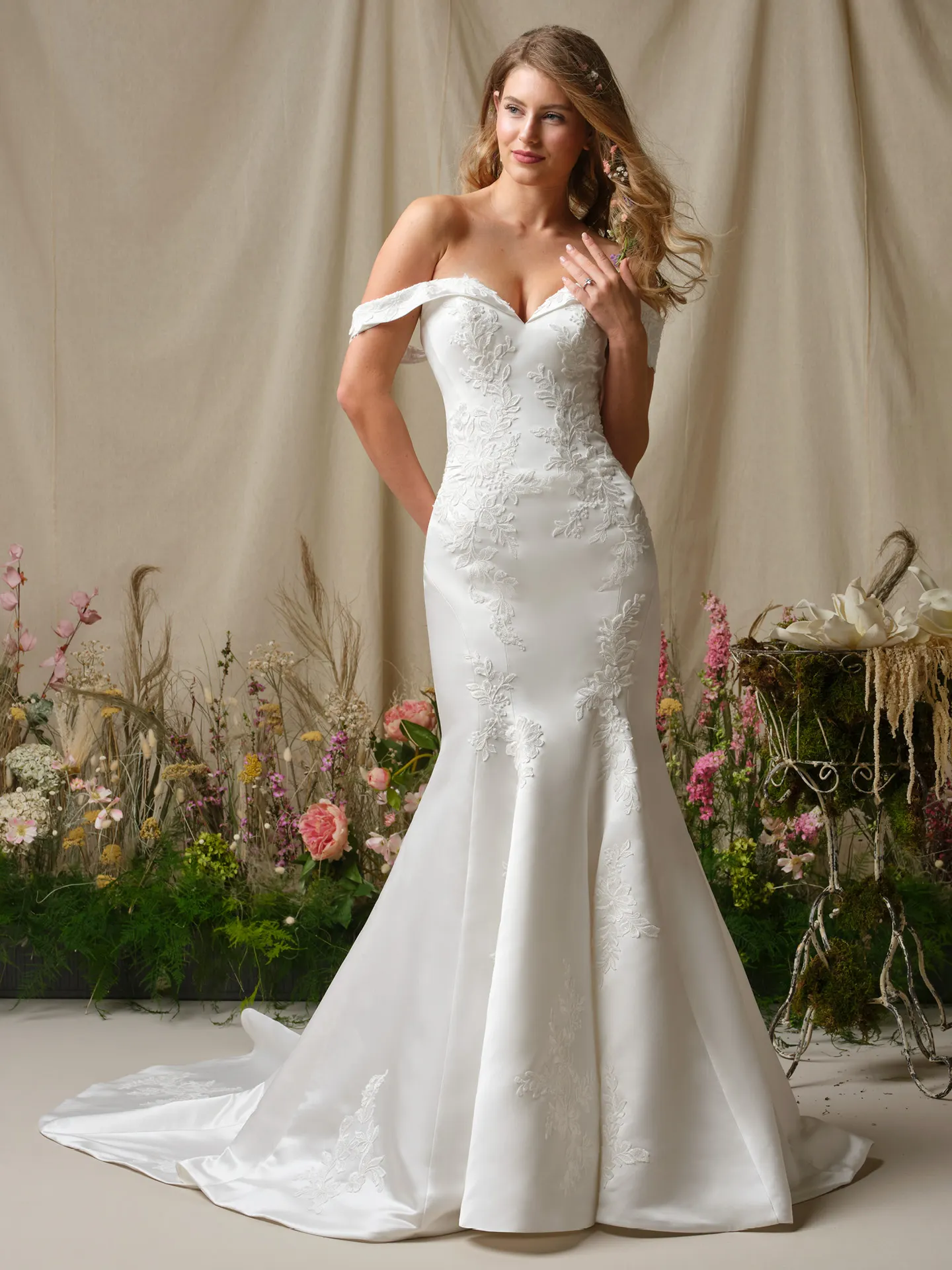 Rebecca Ingram Miley front view of off-the-shoulder sequined lace fit-and-flare wedding dress