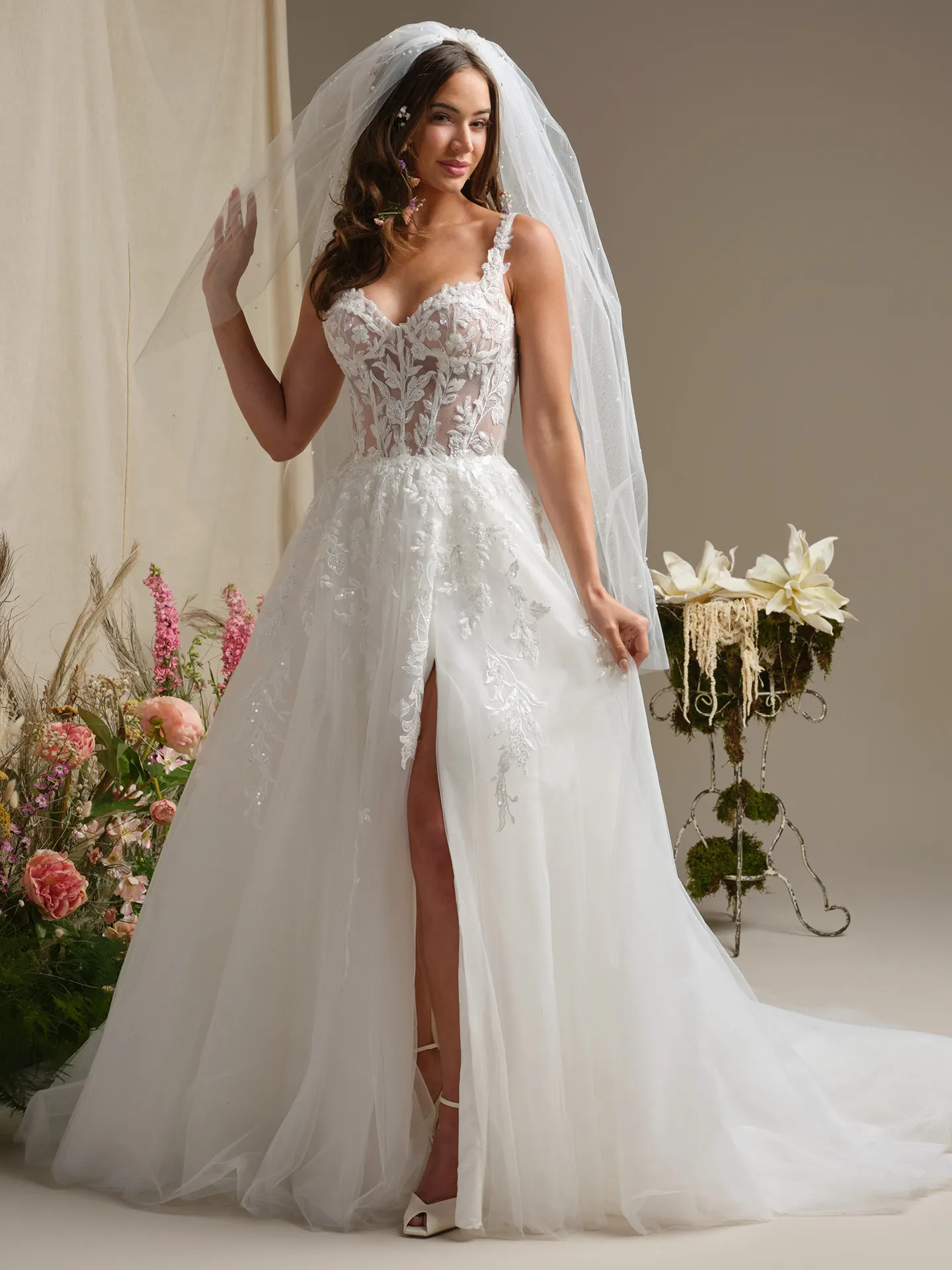 Rebecca Ingram Susan ballgown front view with illusion bodice and floral details