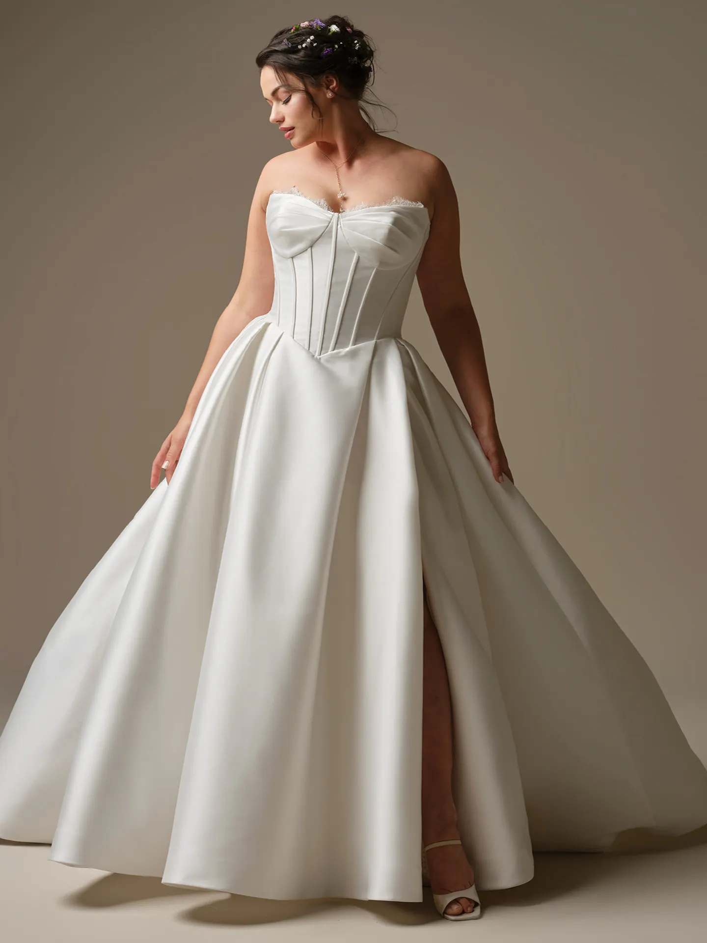Rebecca Ingram Zorina ballgown front view with lace trim and side slit