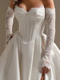 Zorina detachable off-the-shoulder corded lace sleeves with flared cuffs and button detailing