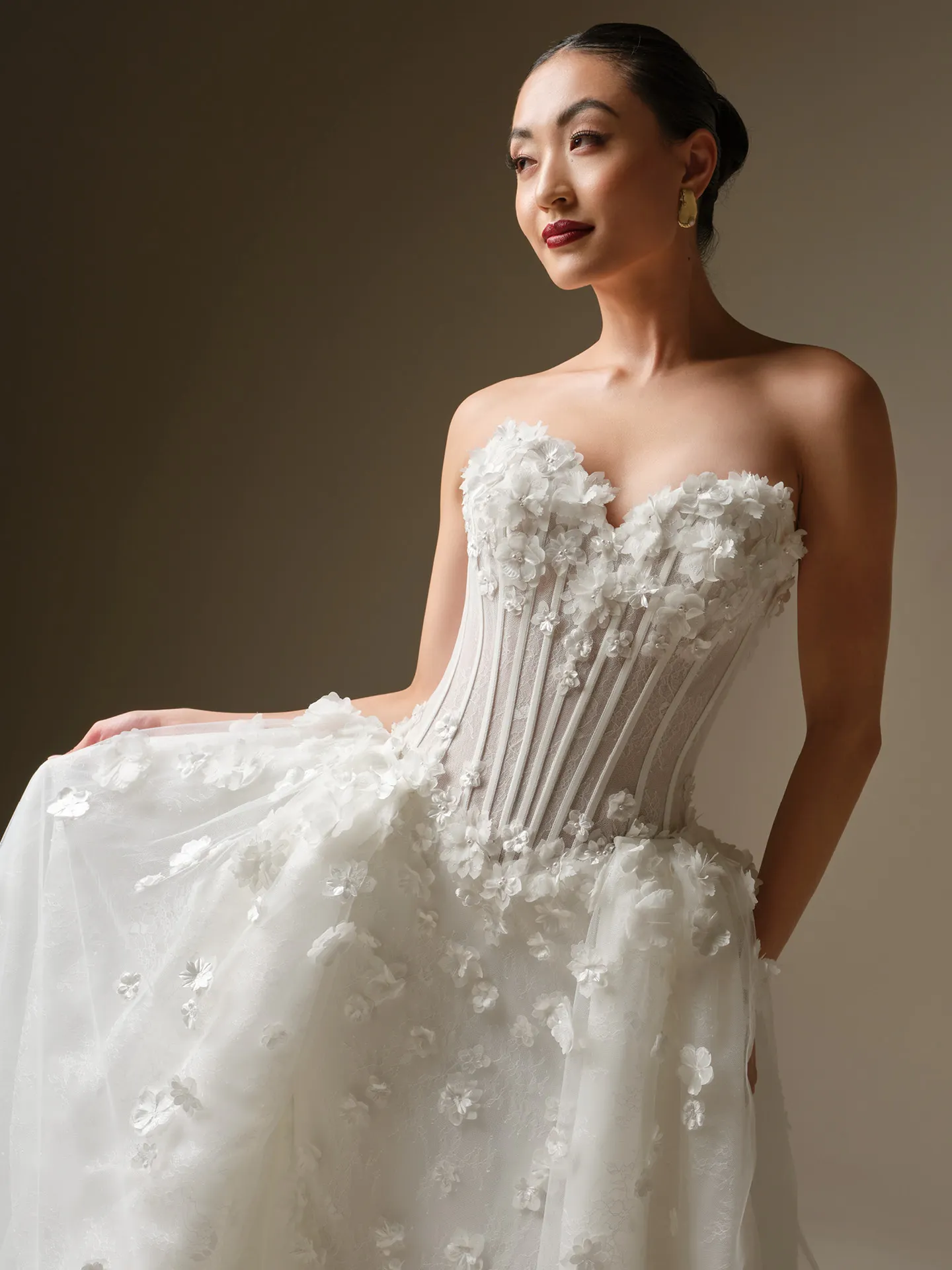 Maggie Sottero Akari sweetheart fit-and-flare dress with 3-D flower detail, front view.