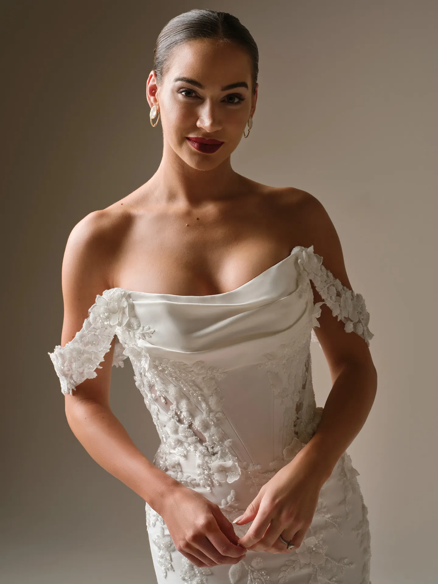 Maggie Sottero Burke beaded lace fit-and-flare dress, front view.