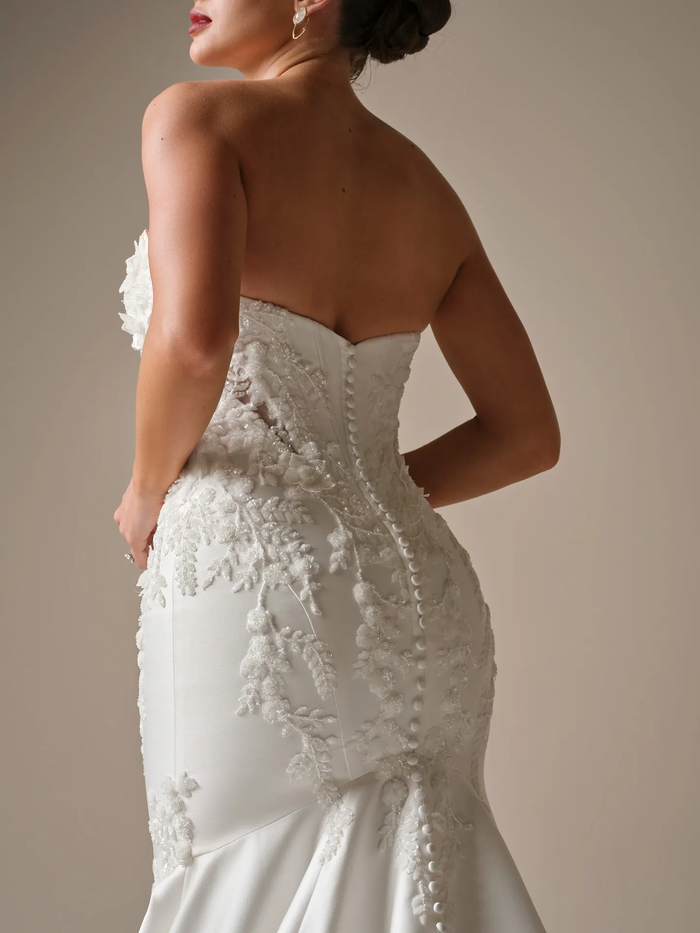 Maggie Sottero Burke, back view beaded lace fit-and-flare wedding dress.