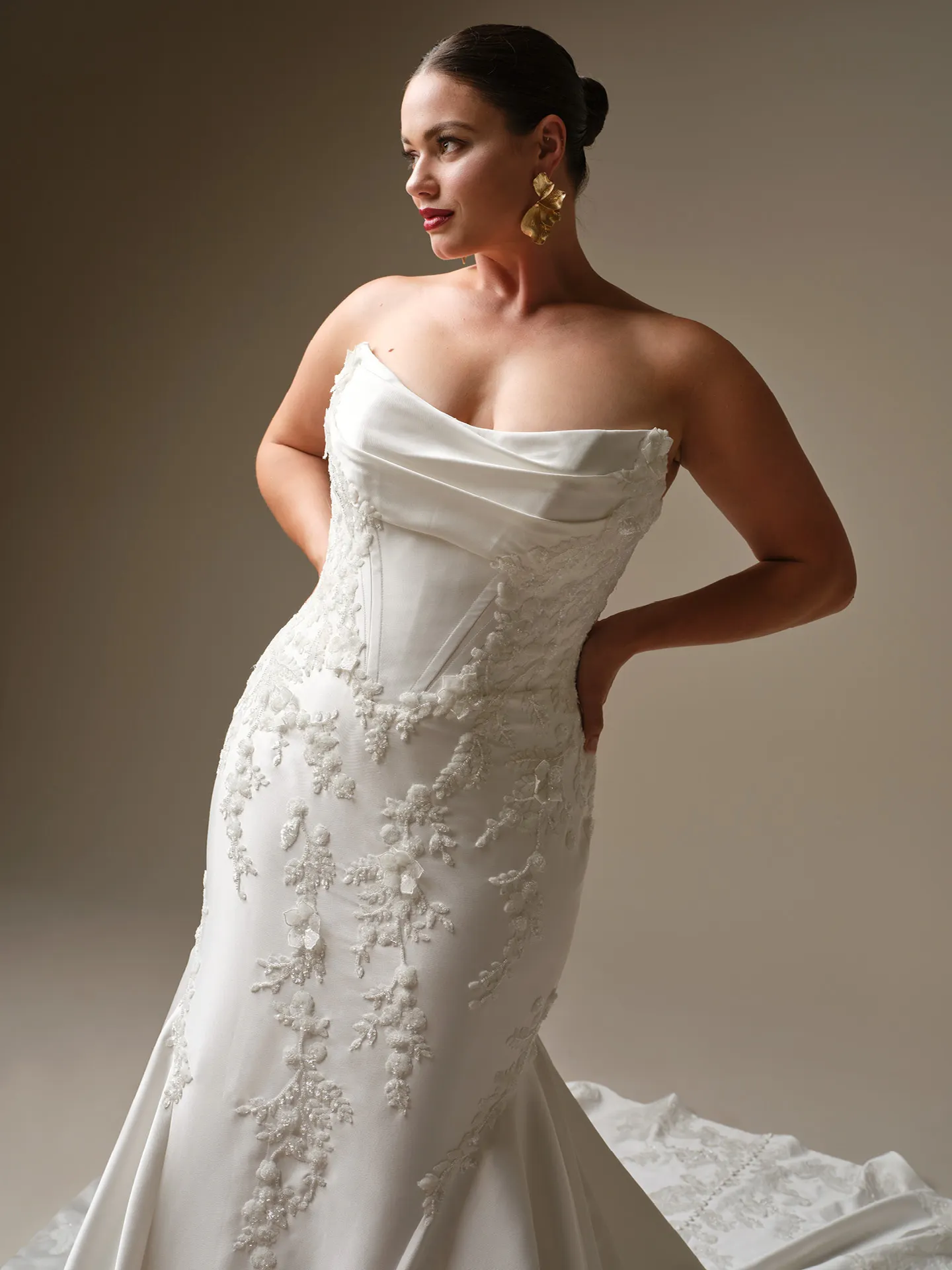 Maggie Sottero Burke beaded lace fit-and-flare wedding dress front view.