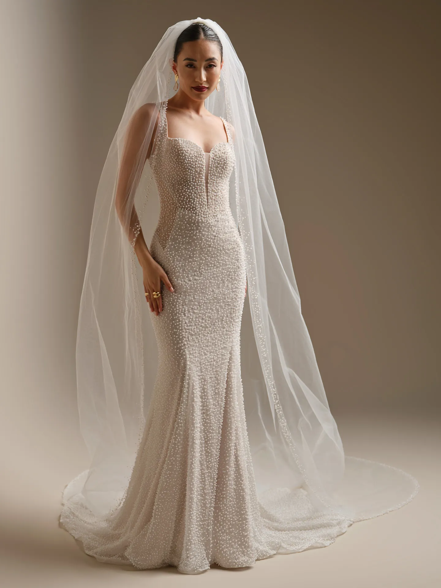 Sottero and Midgley Cooper pearl glitter tulle sheath wedding dress, front view.