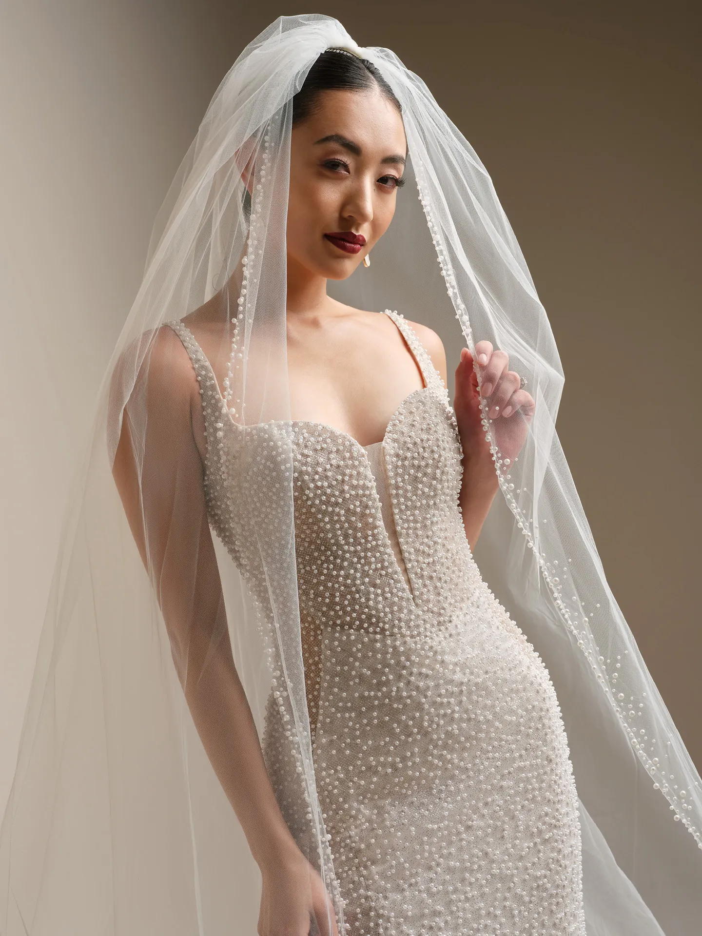 Sottero and Midgley dress with Cooper Cathedral veil and pearl edge,, front view.