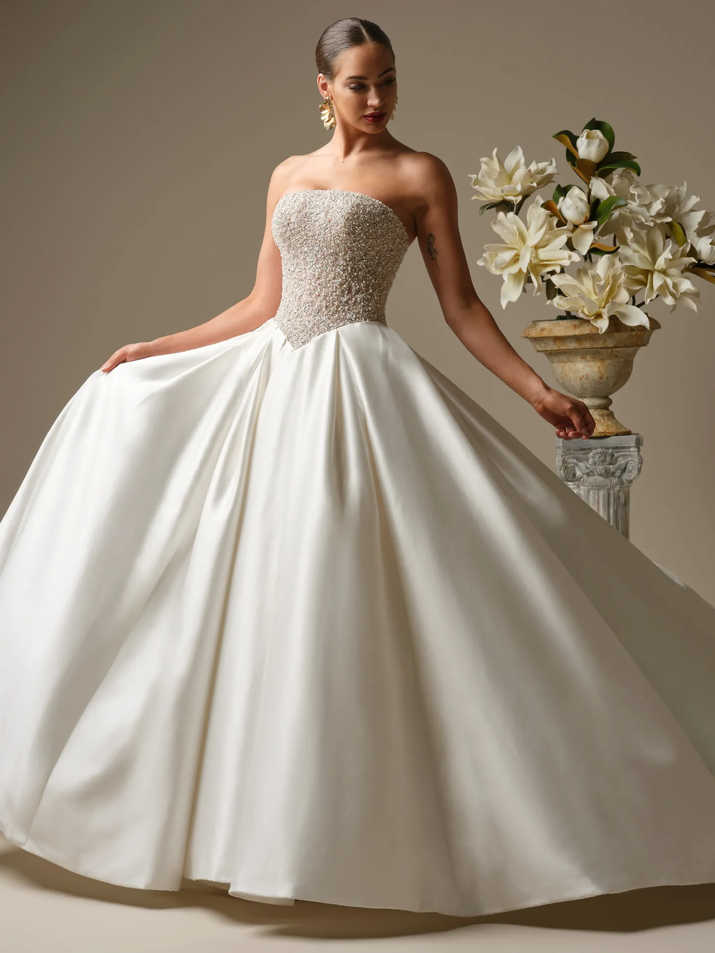 Sottero and Midgley Dmara ballgown, front view with beaded bodice and satin skirt.