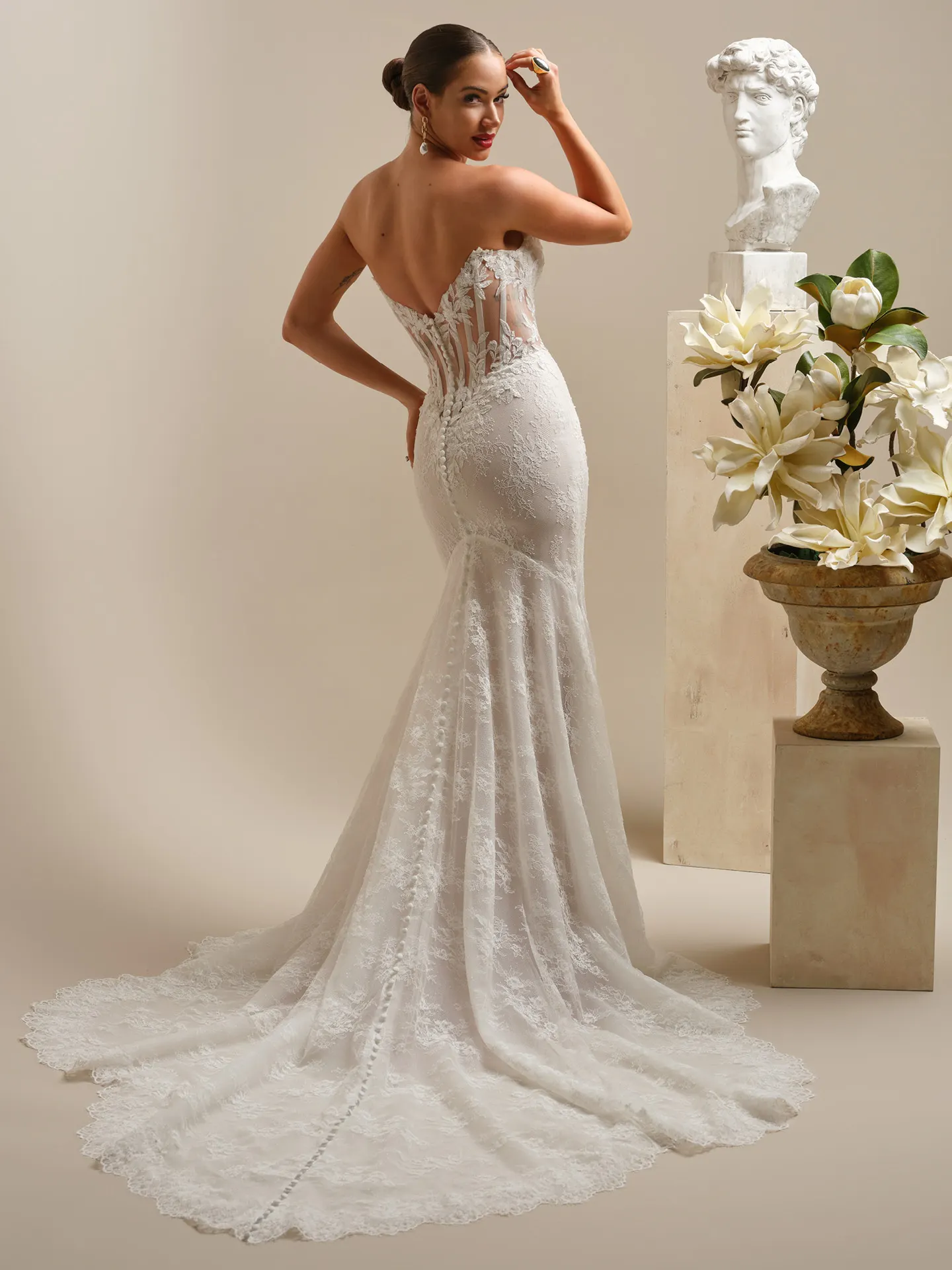 Sottero and Midgley Dublin, back view lace sheath dress with V-back and floral detail.