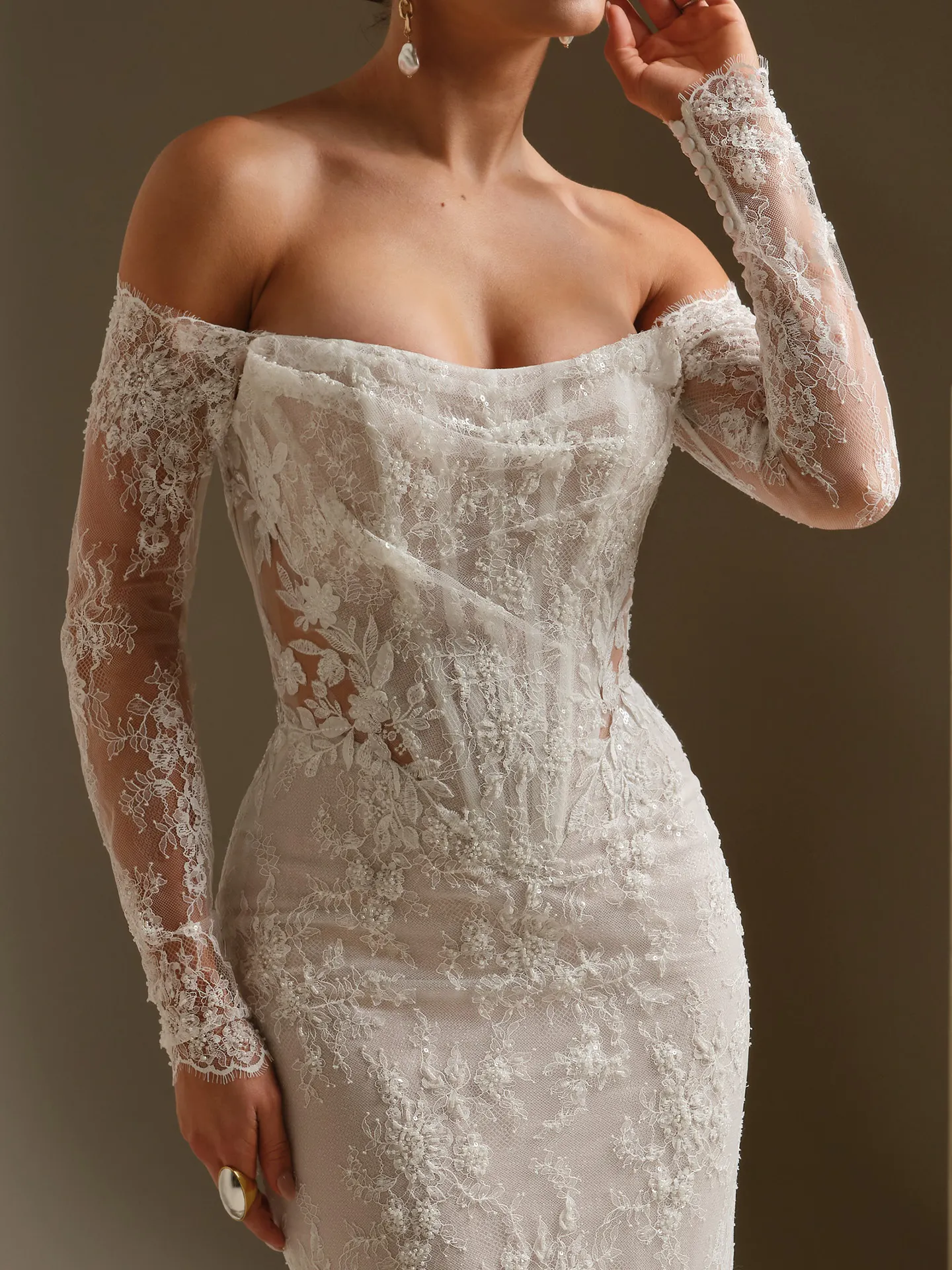 Sottero and Midgley Dublin lace dress with detachable long sleeves, close view.