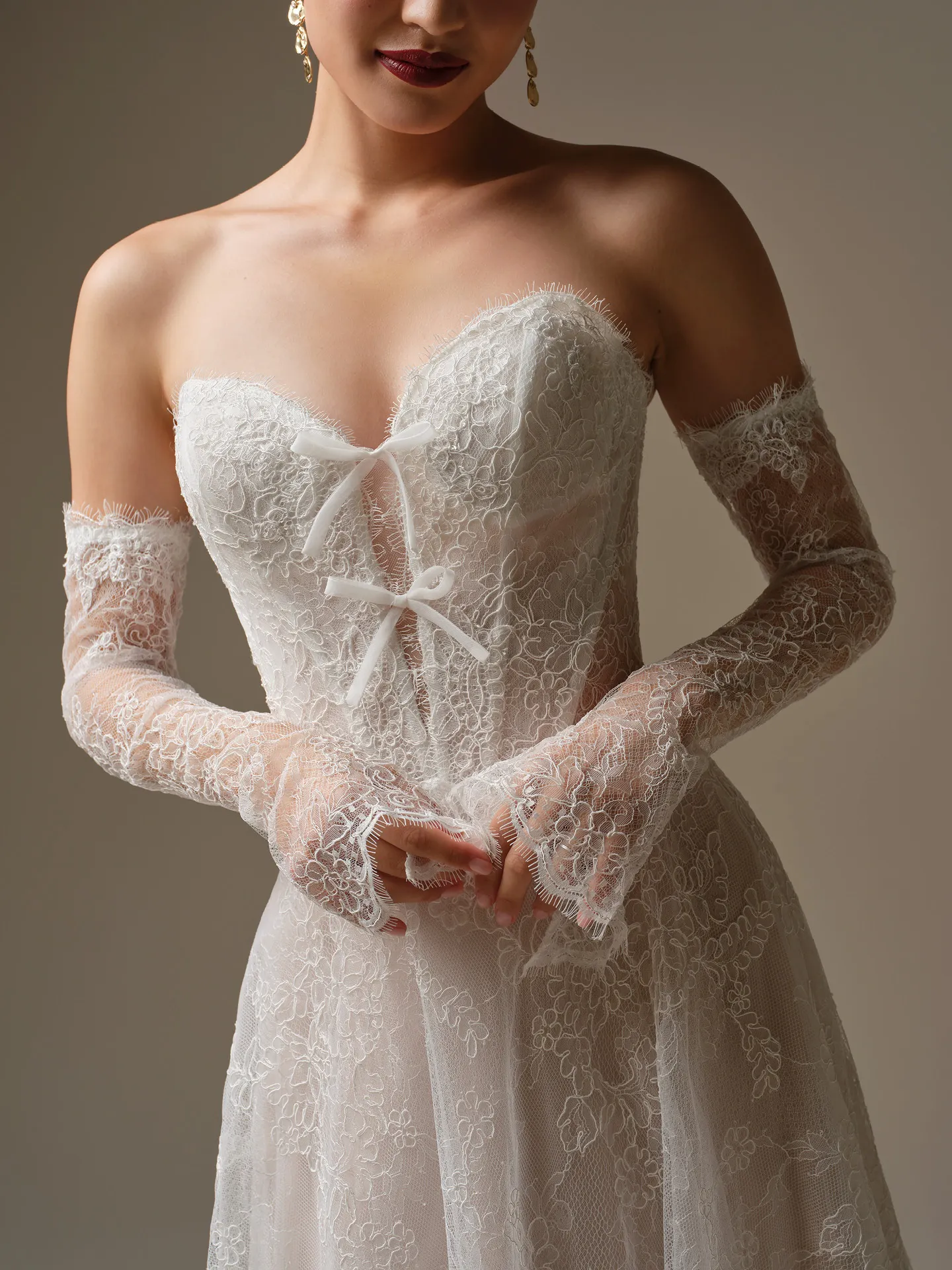 Sottero and Midgley Granger, front view lace wedding dress with off-shoulder long sleeves.