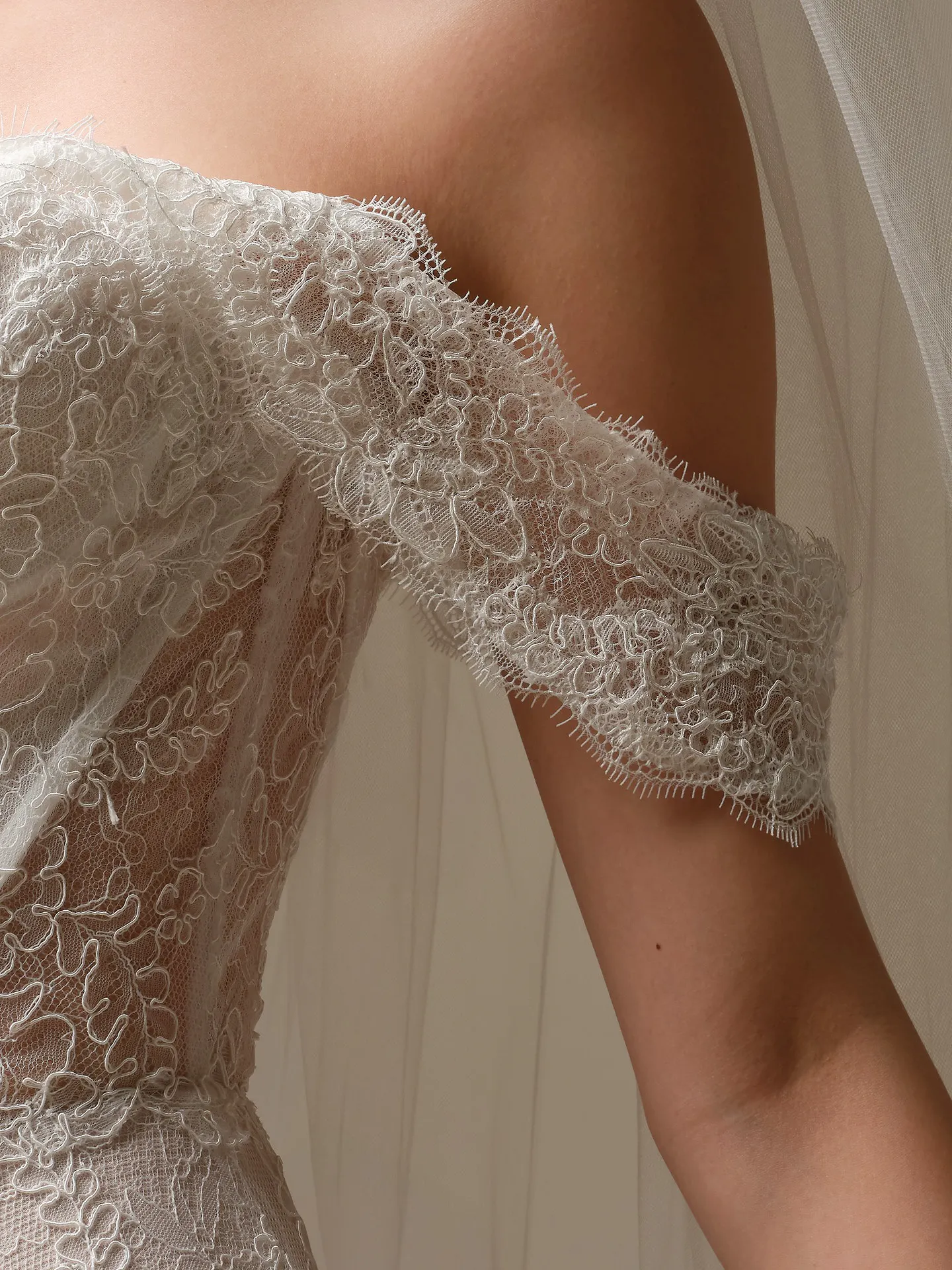 Sottero and Midgley Granger off-the-shoulder lace cap-sleeve detail.