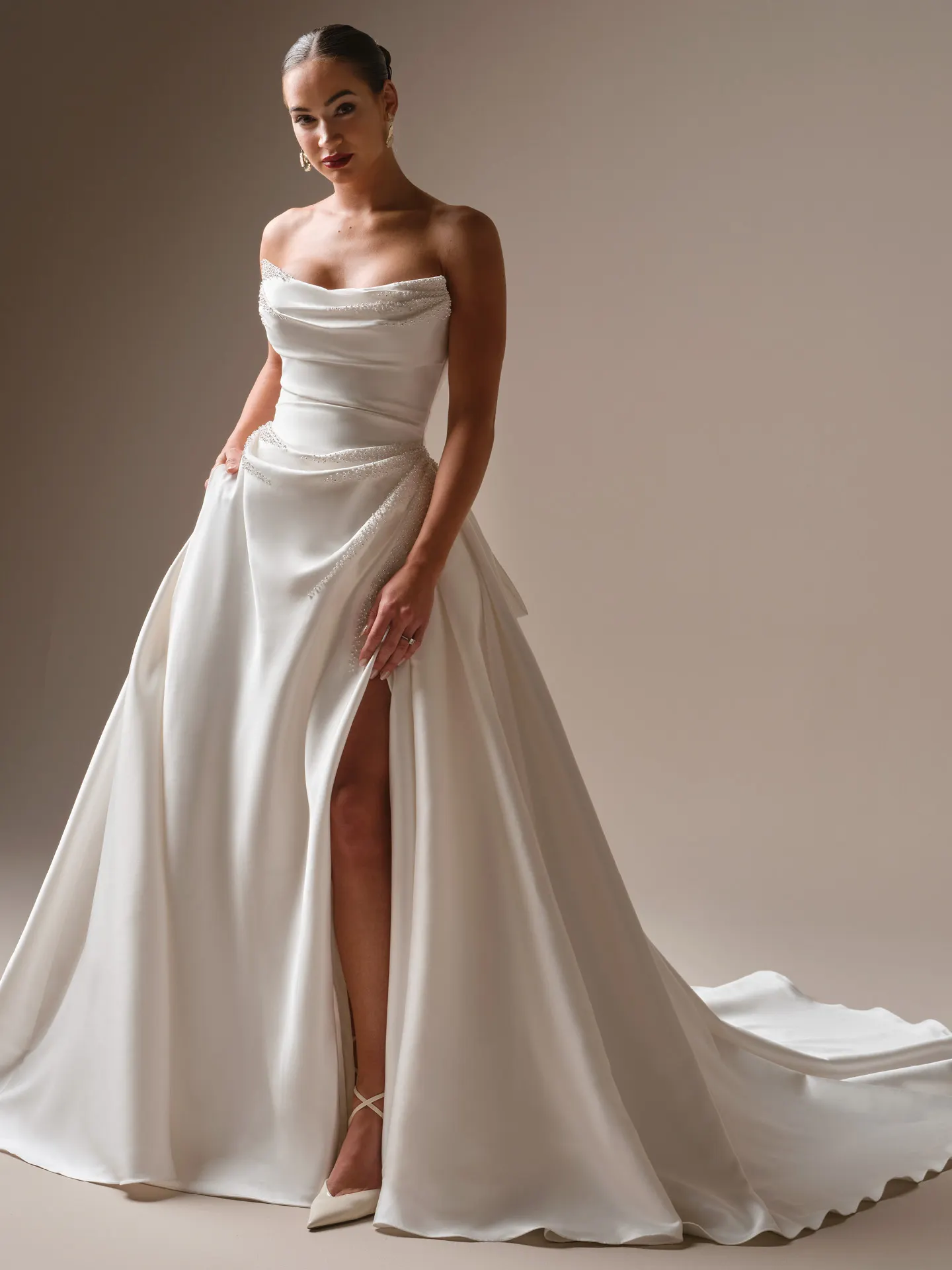 Sottero and Midgley Kincaid satin ballgown, front view with thigh-high slit.