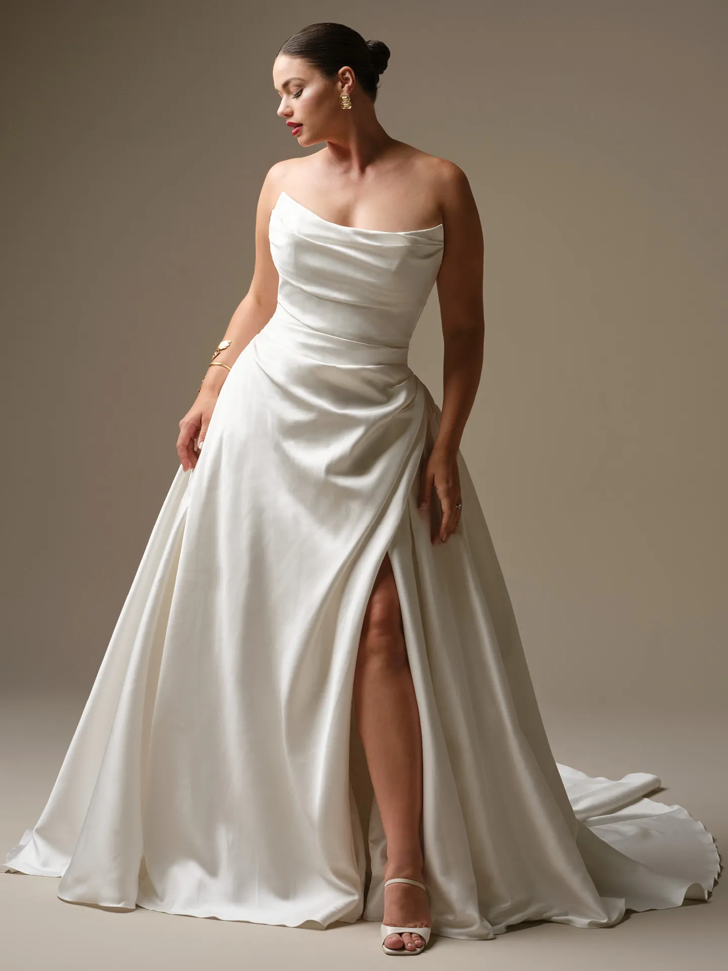 Sottero and Midgley Kincaid, front view beaded satin ballgown with thigh-high slit.