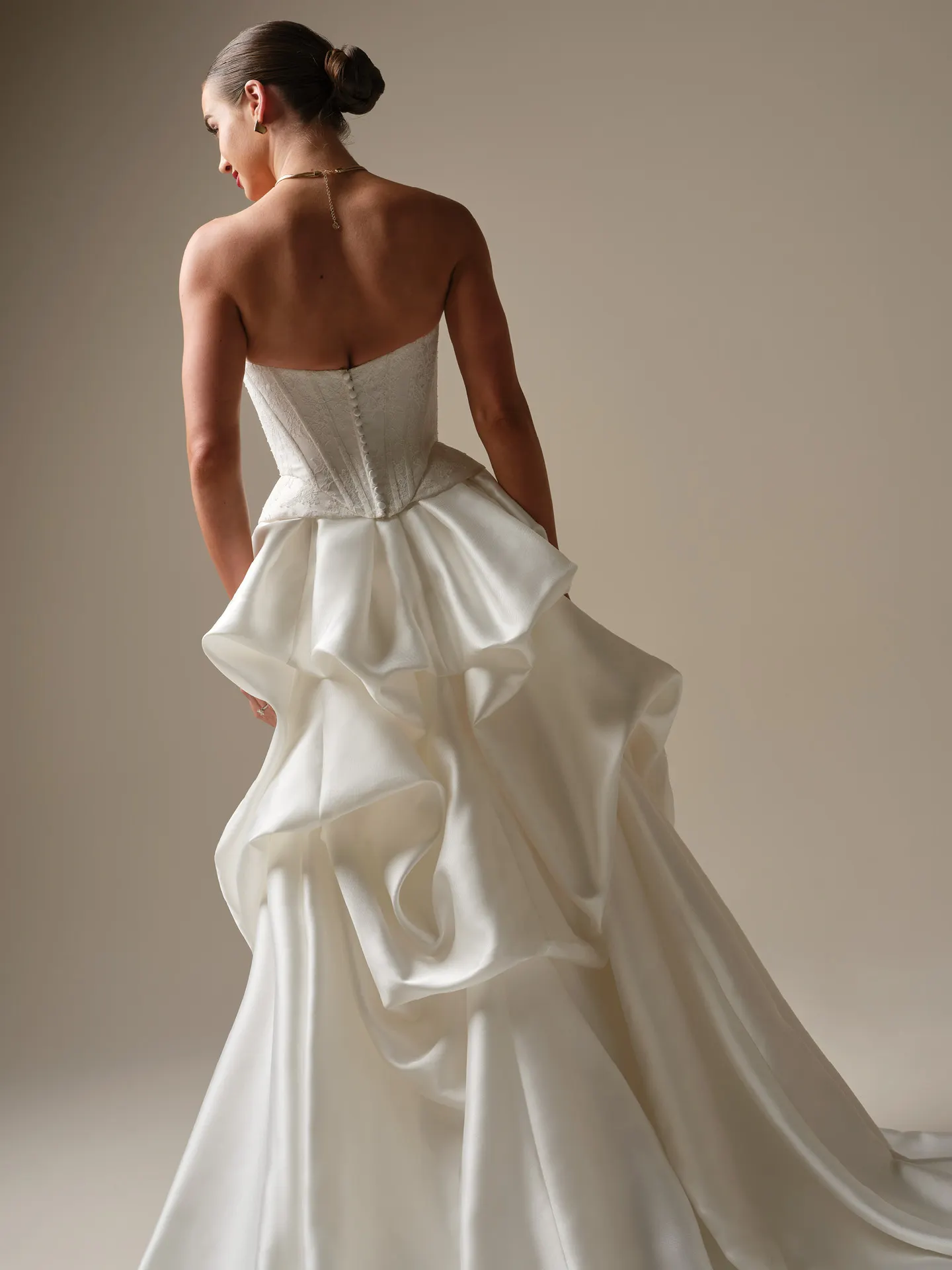 Sottero and Midgley Lassen strapless lace sheath wedding dress, back view.