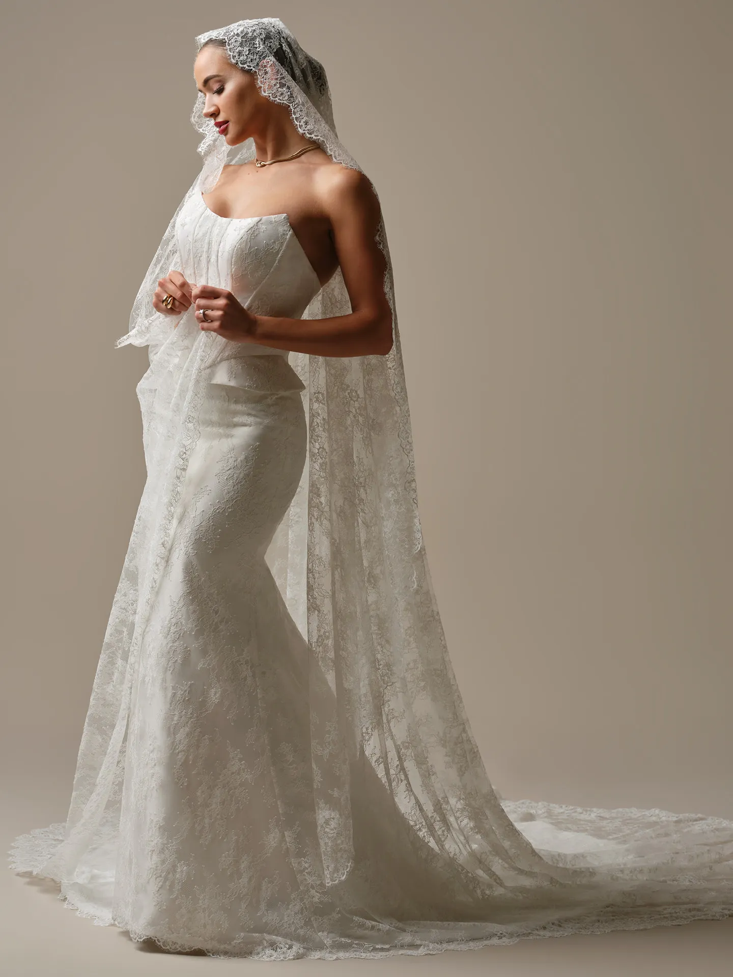Sottero and Midgley Lassen cathedral veil with Chantilly lace, side view.