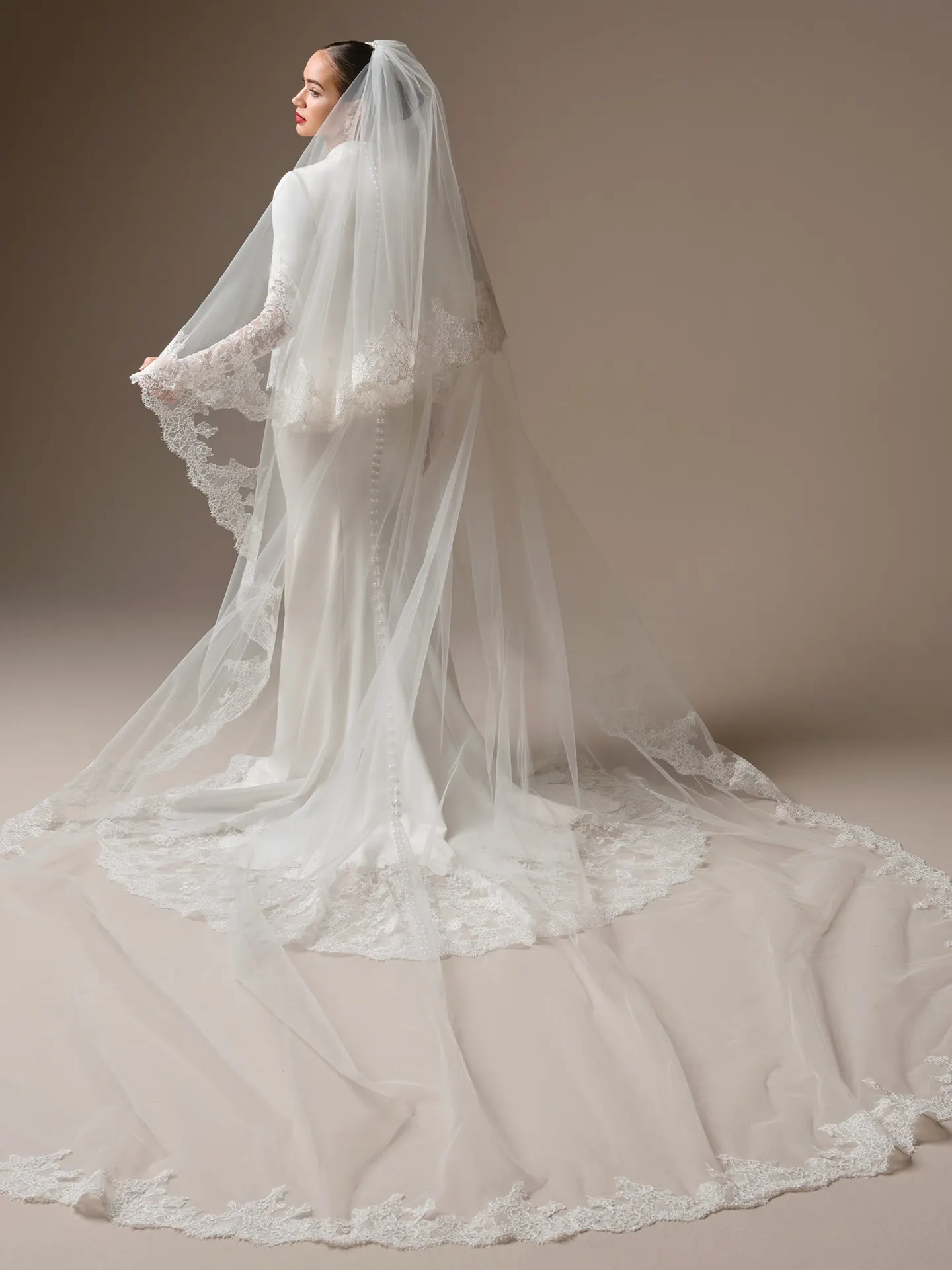 Sottero and Midgley Lovai royal veil with blusher and Chantilly lace, side view.