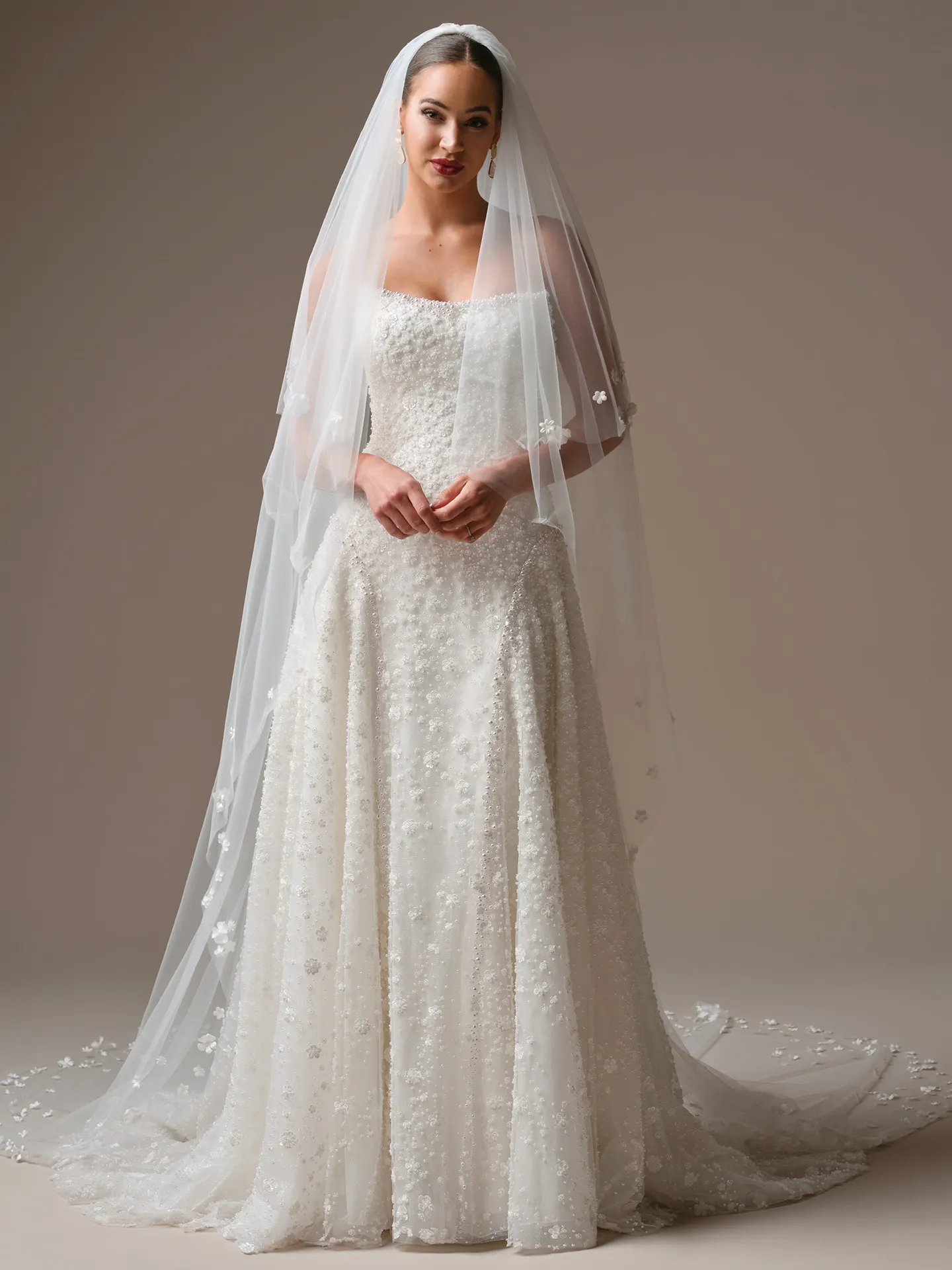 Sottero and Midgley Marceline cathedral veil and 3D flower dress, front view.