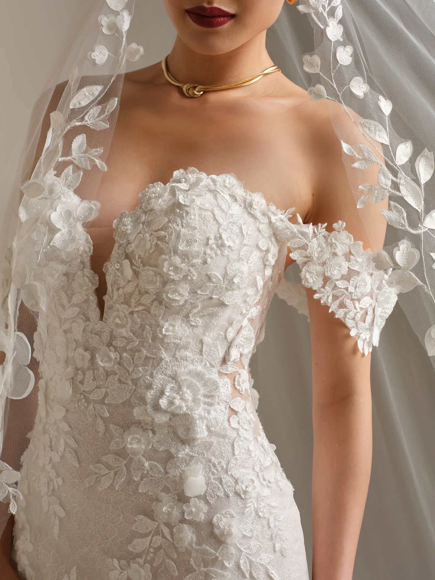 Sottero and Midgley Rashida fit-and-flare lace dress in close-up, floral details visible.