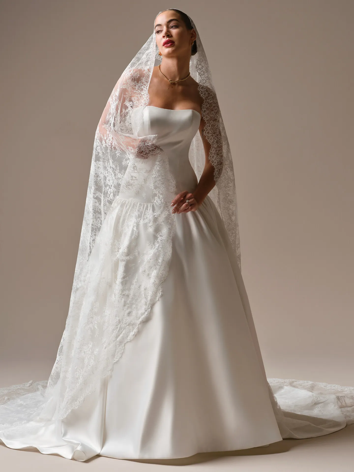 Sottero and Midgley Tokyo, front view strapless satin ballgown with lace veil.