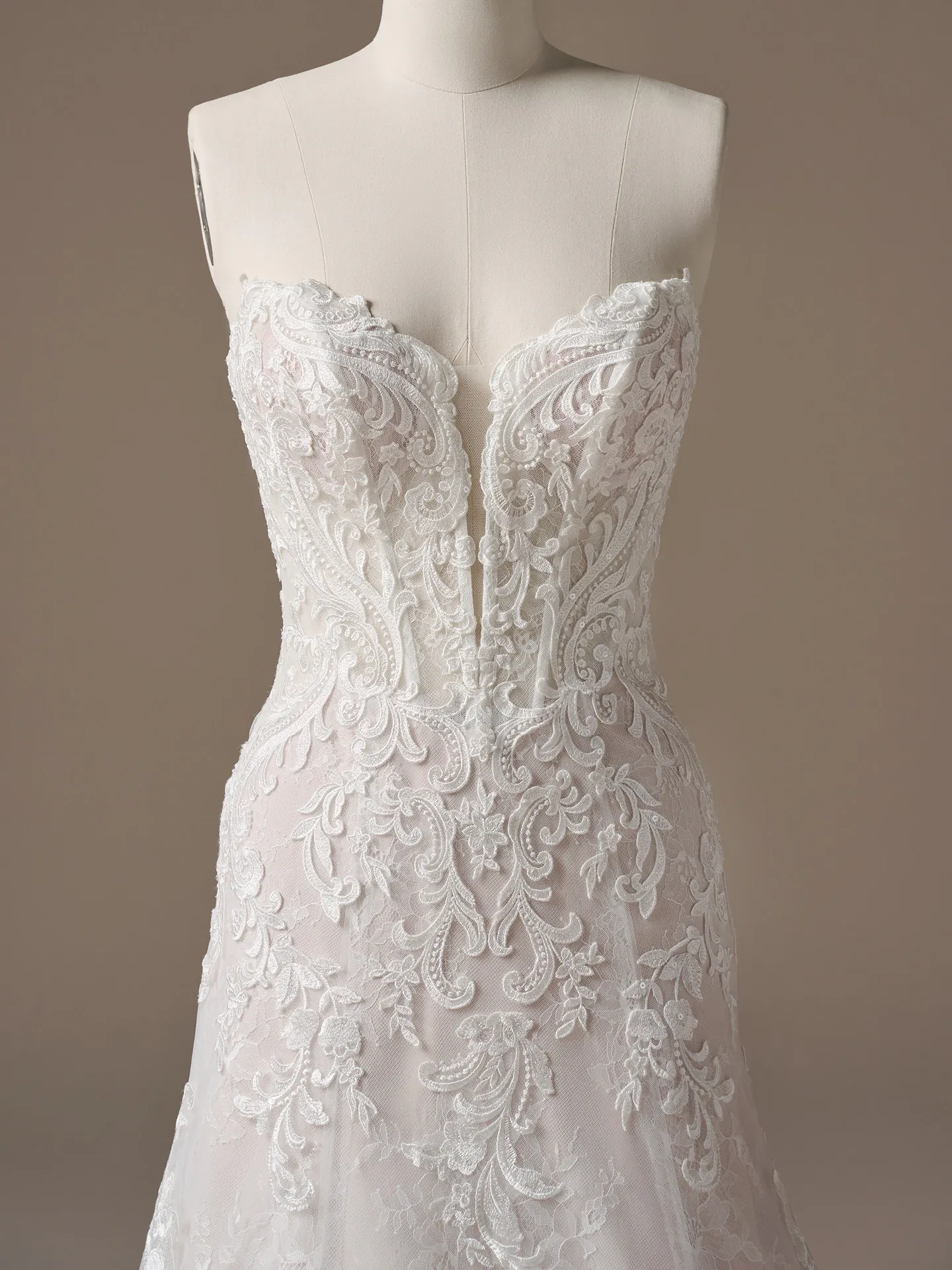 Maggie Sottero Farrah, front view, plunging lace A-line dress with sequin embellishments.