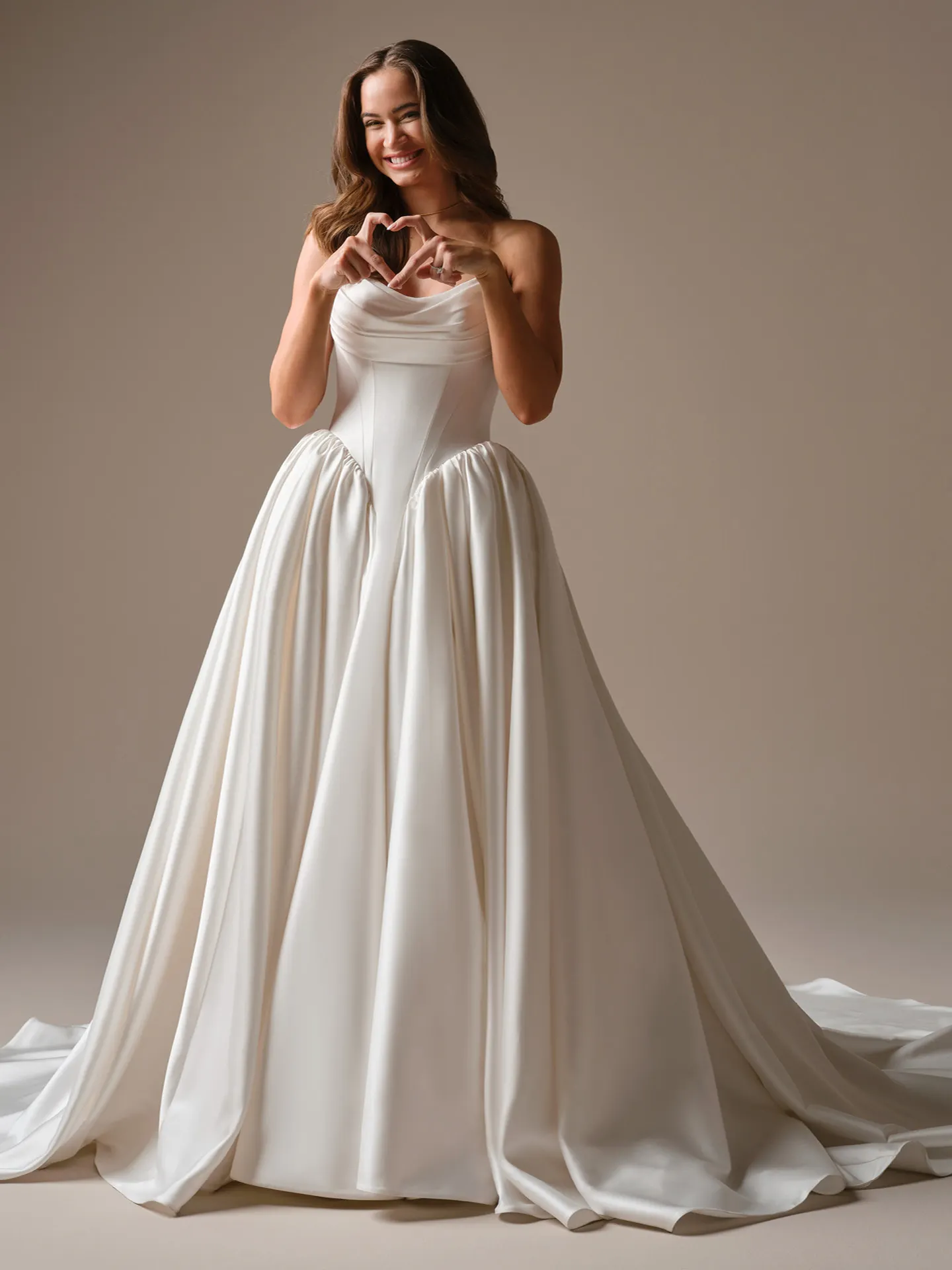 Maggie Sottero Hudson strapless draped bodice ballgown, front view.