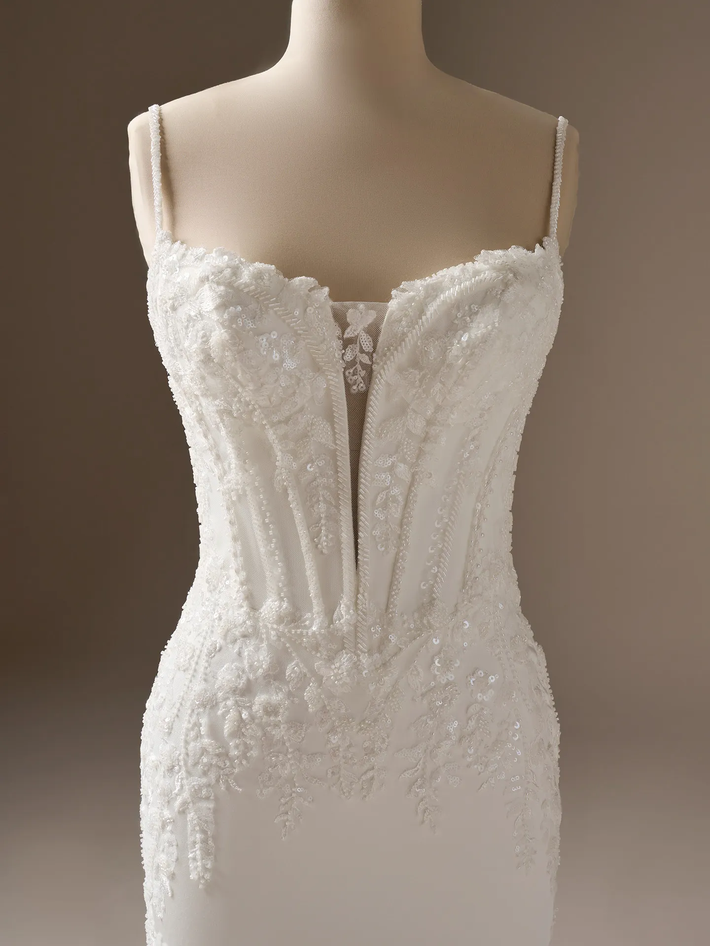 Maggie Sottero India, front view, beaded cat eye sheath wedding dress.
