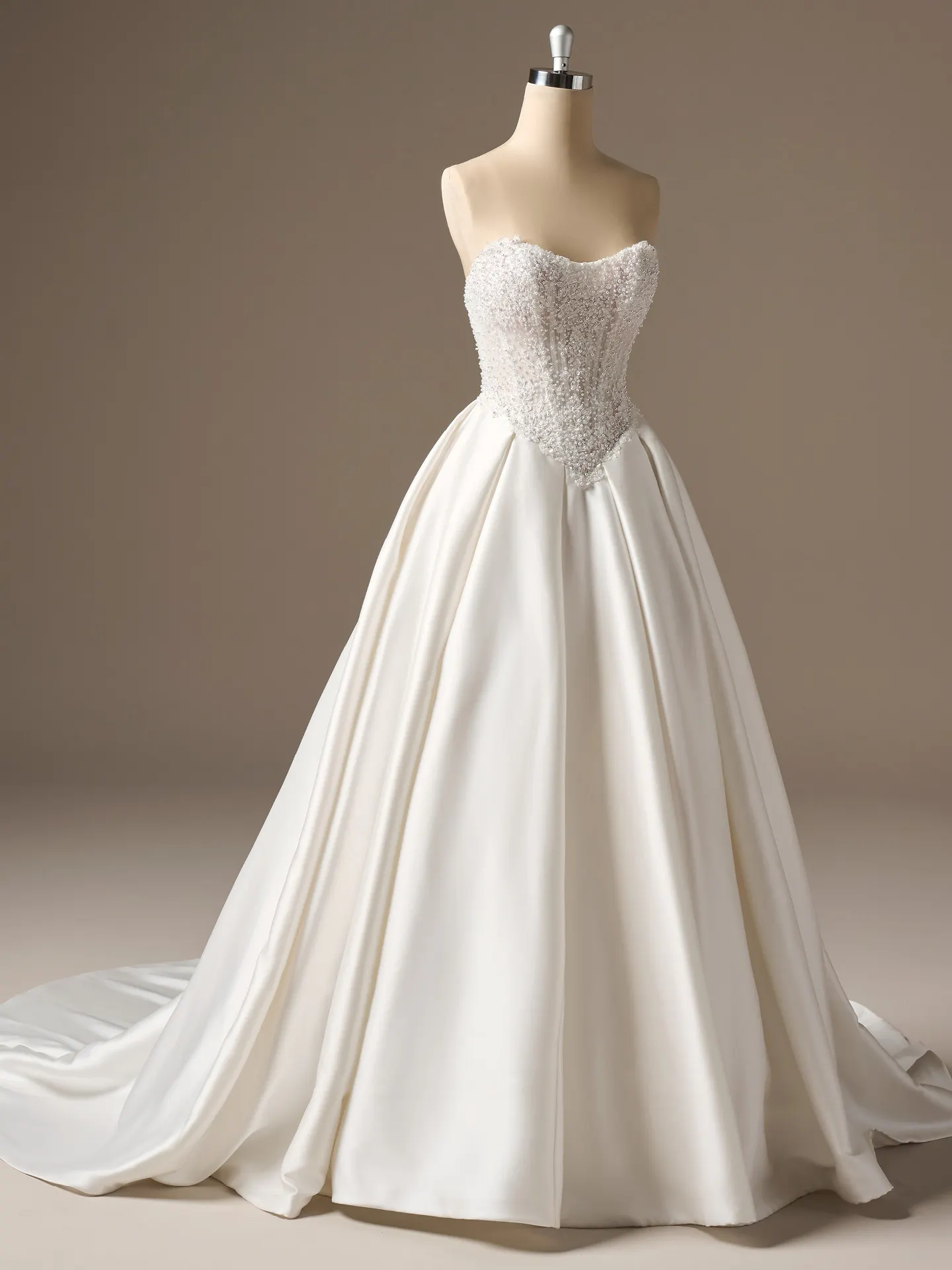 Maggie Sottero London strapless beaded lace ballgown, front view.