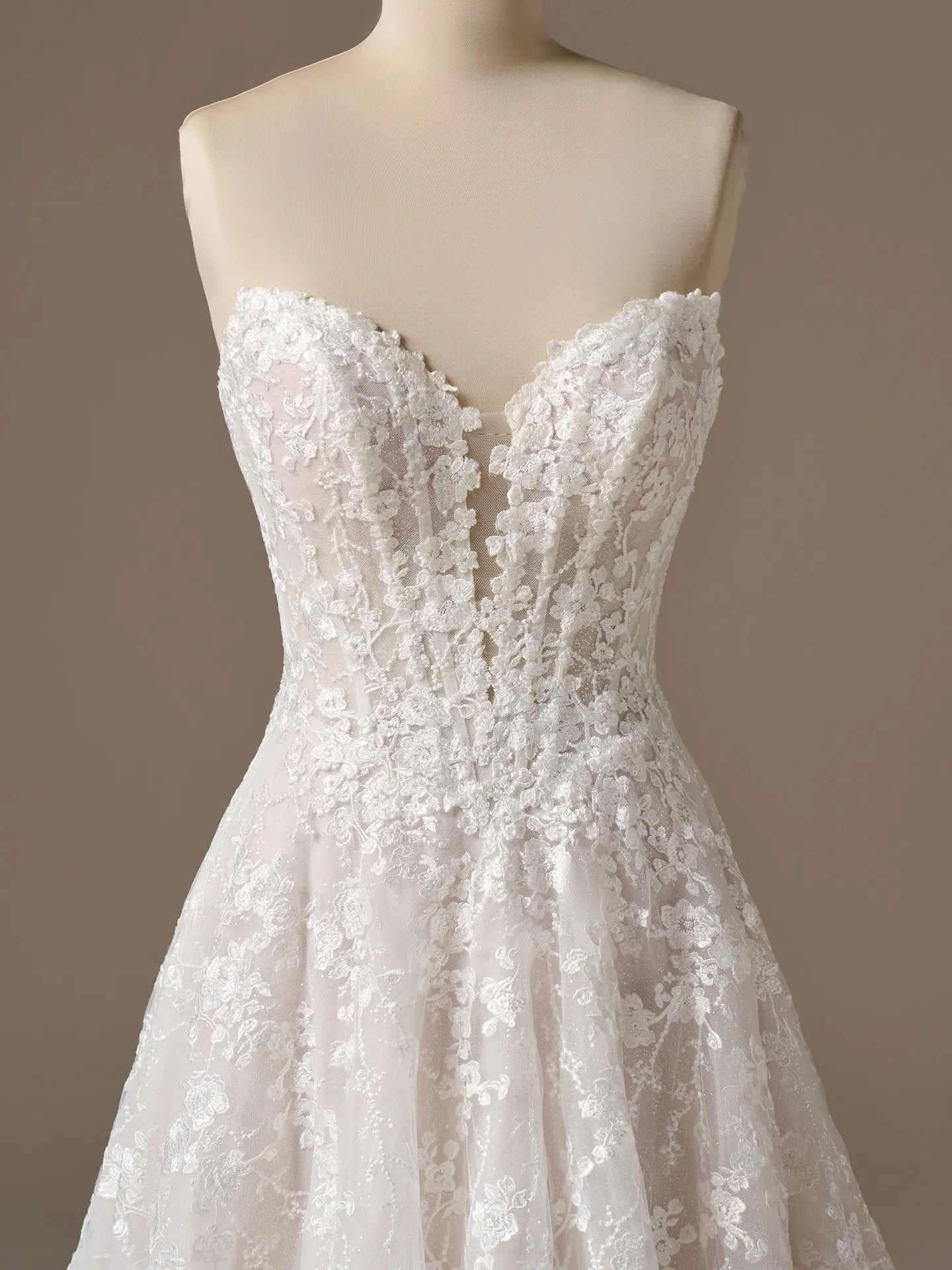 Maggie Sottero Memphis, front view lace A-line wedding dress plunging neckline.