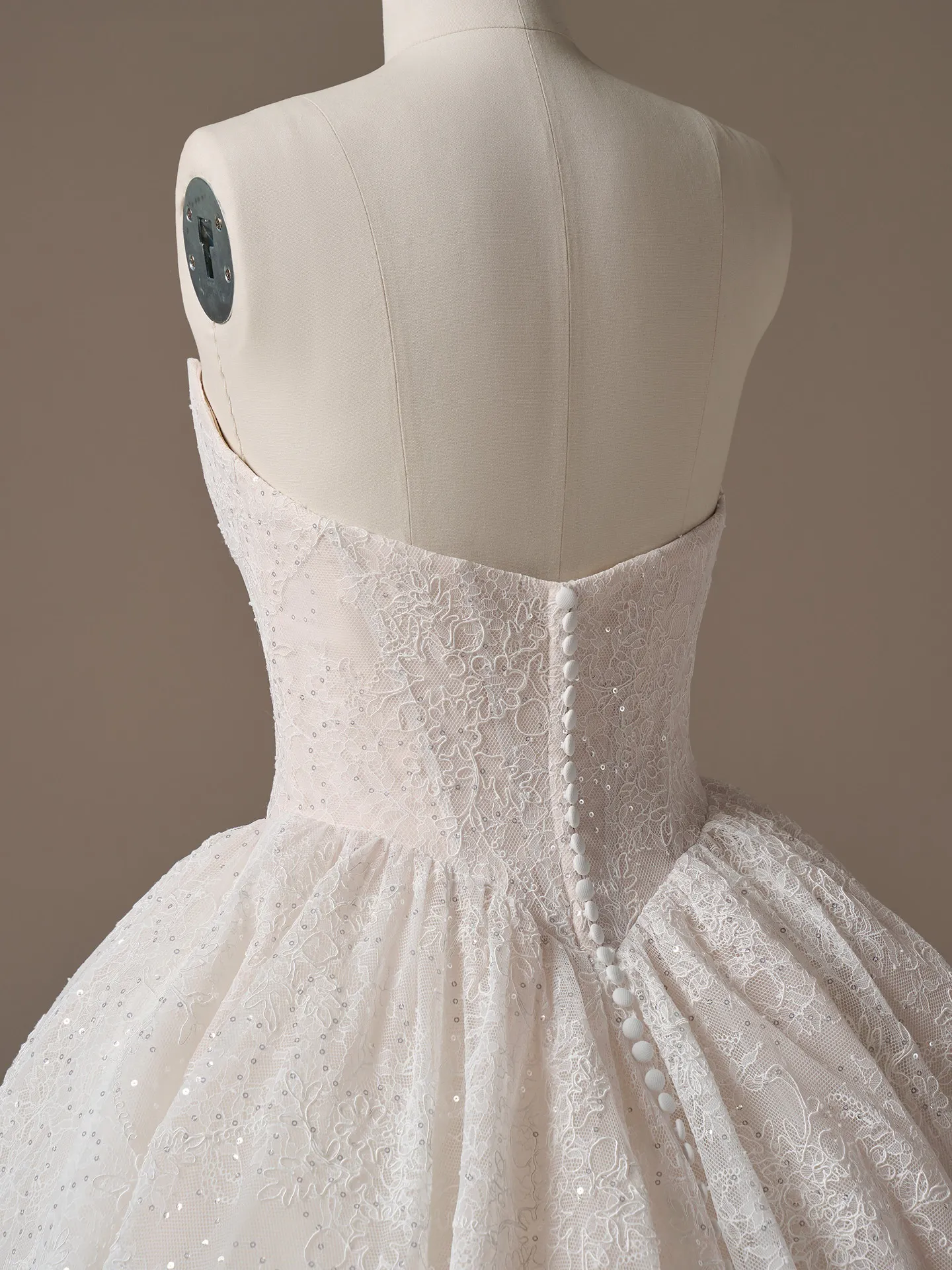 Raquel lace ballgown, back view, Maggie Sottero, button details.