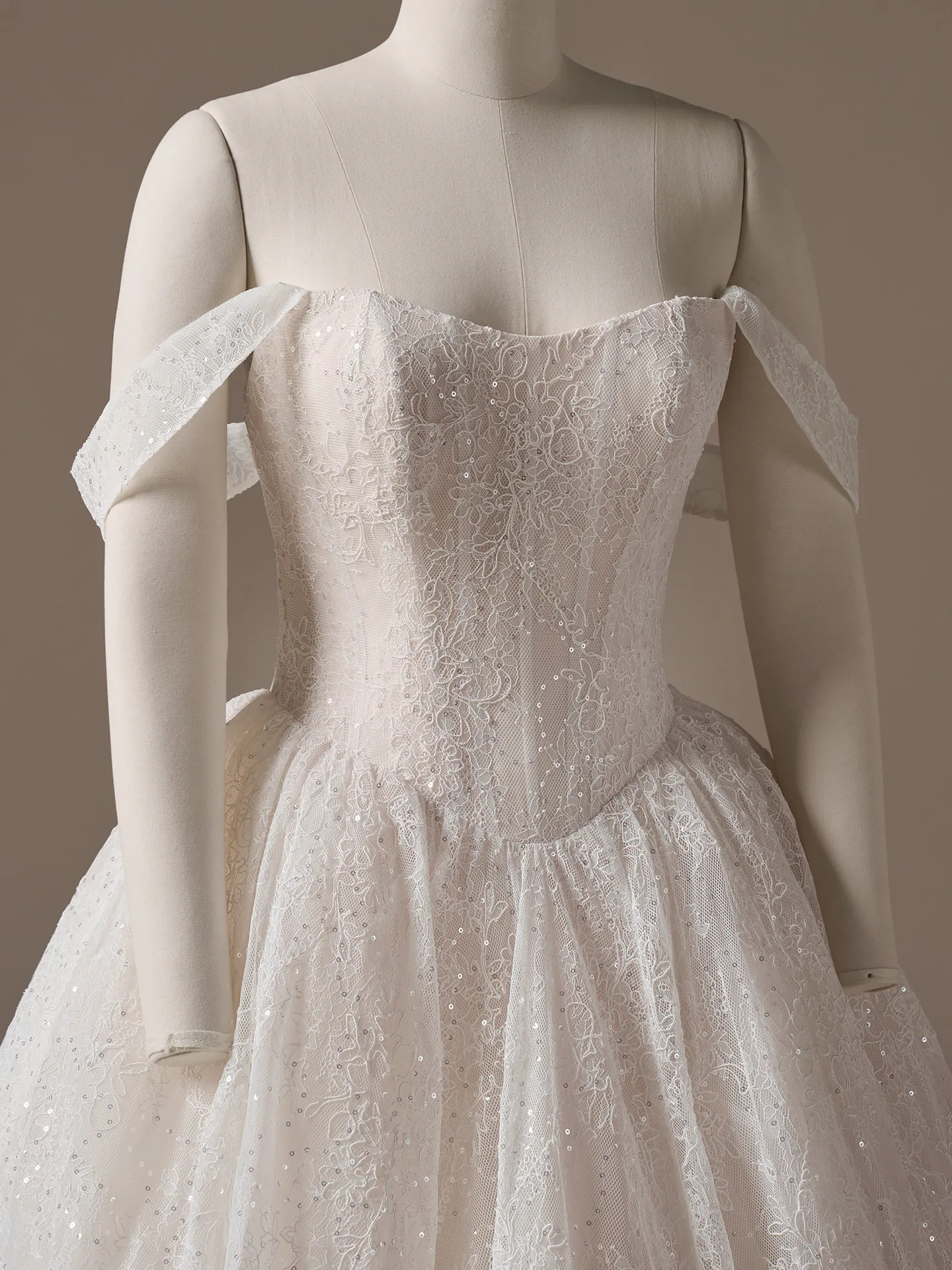 Maggie Sottero Raquel front lace ballgown off-shoulder view.