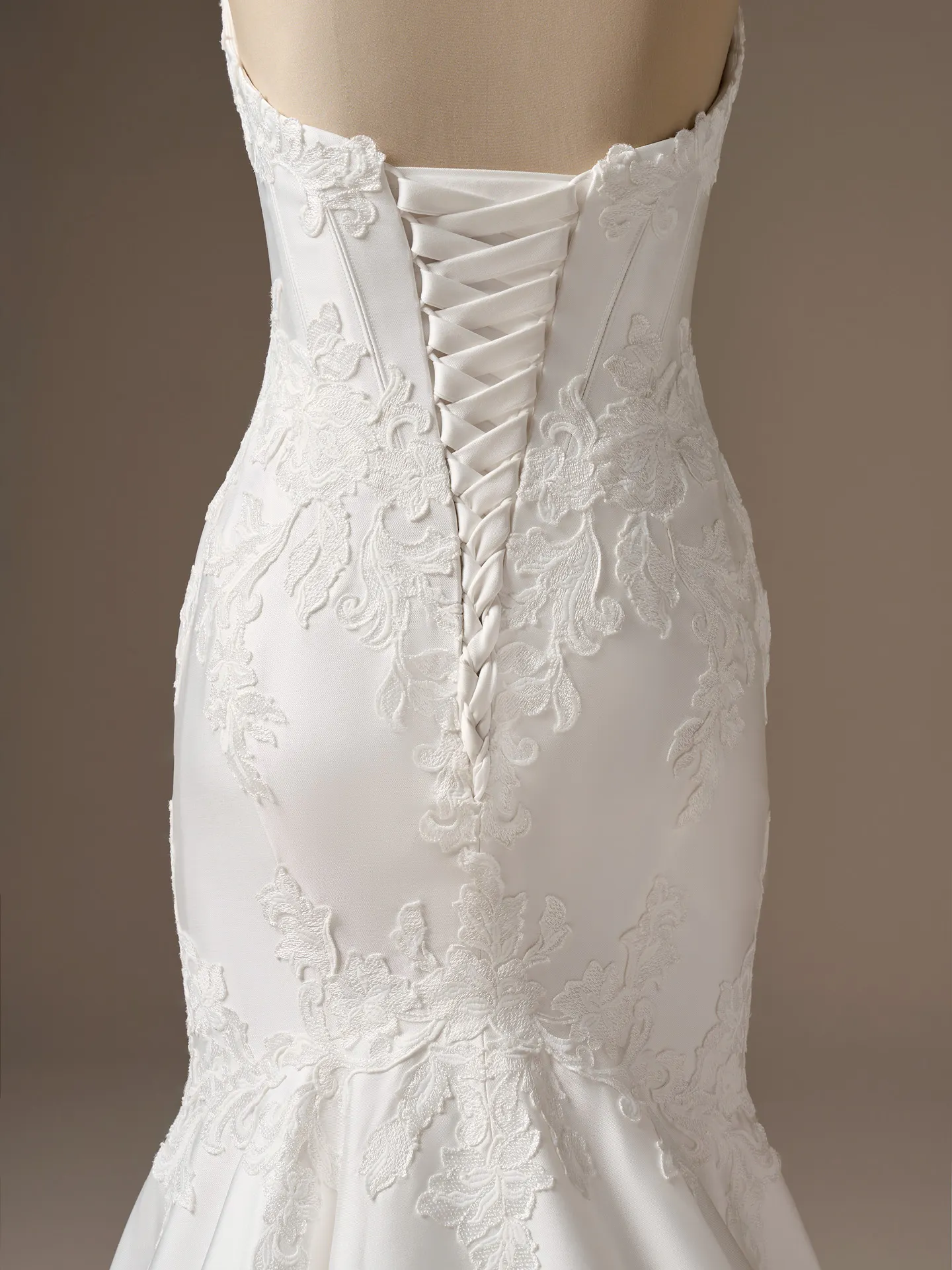 Sottero and Midgley Serafina, back view, lace-up satin ball gown with floral lace detailing.