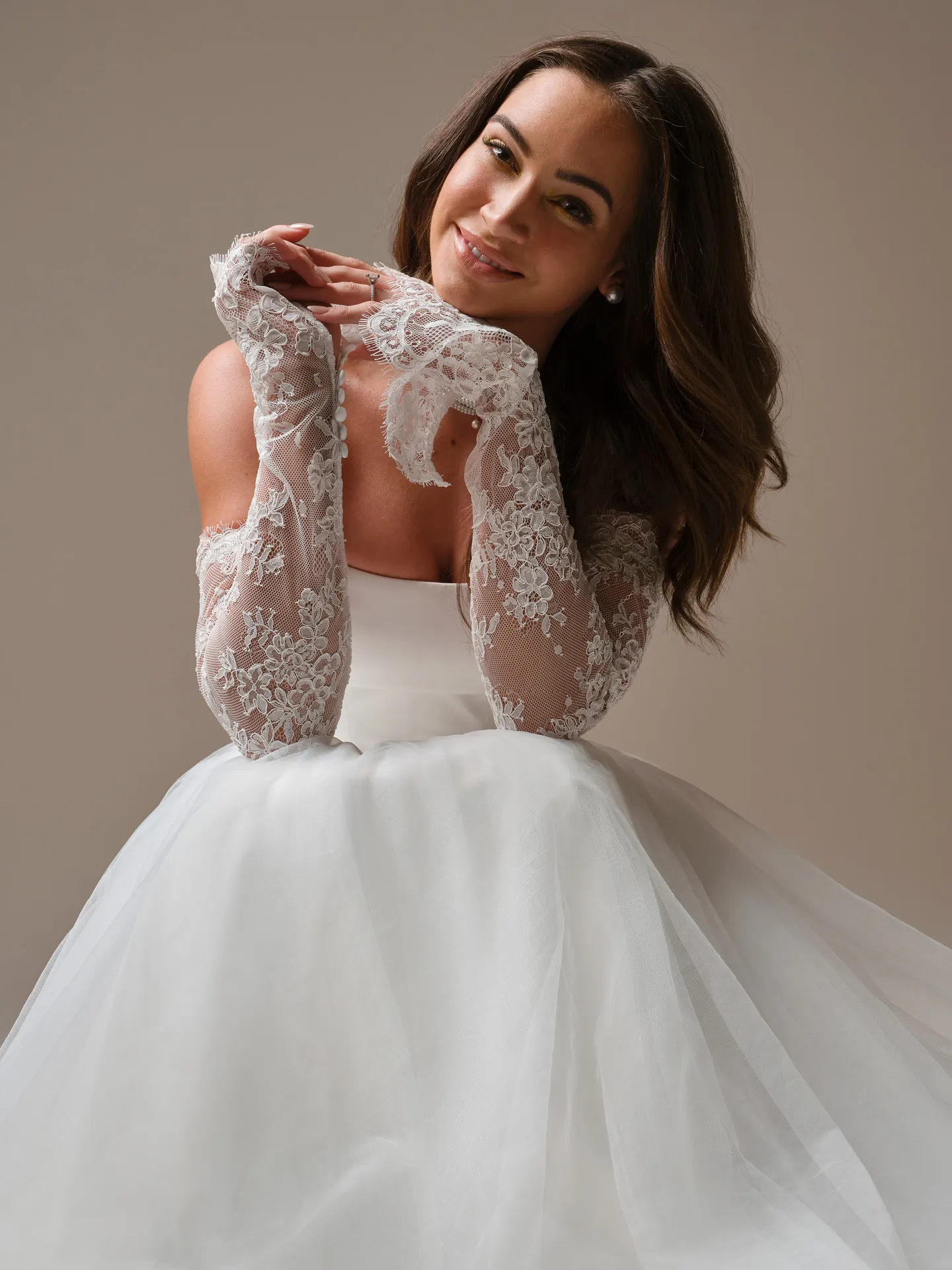 Maggie Sottero Shirley Tulle A-Line dress, front view with lace sleeves.